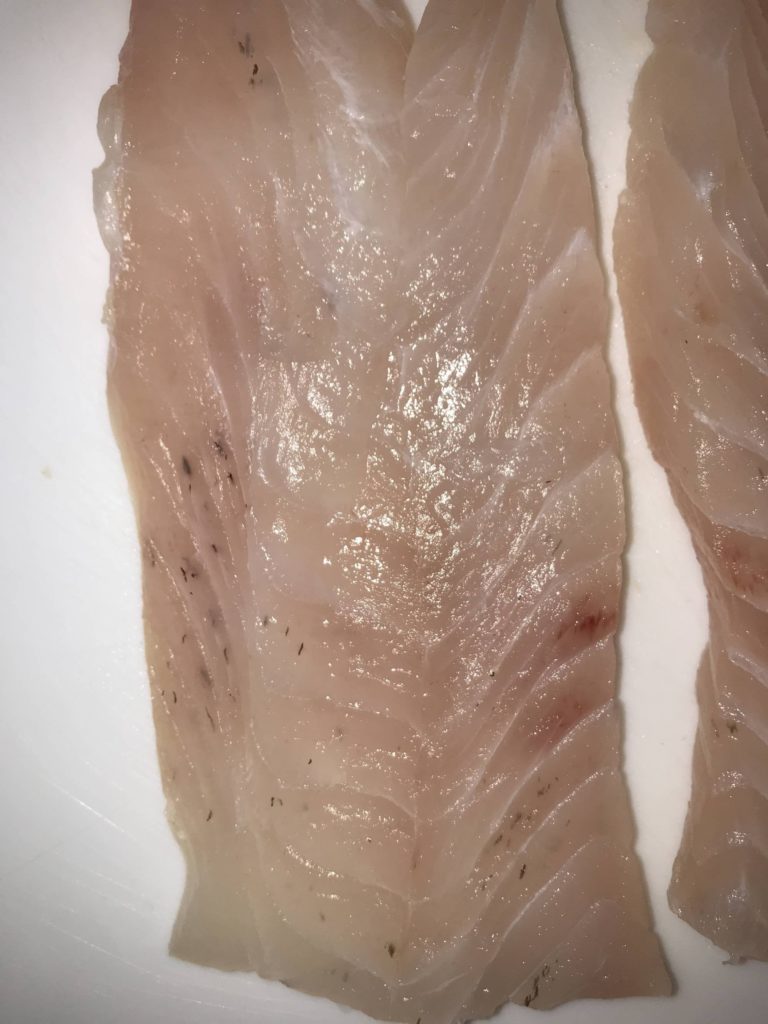 Are black spots on wild caught snapper normal?