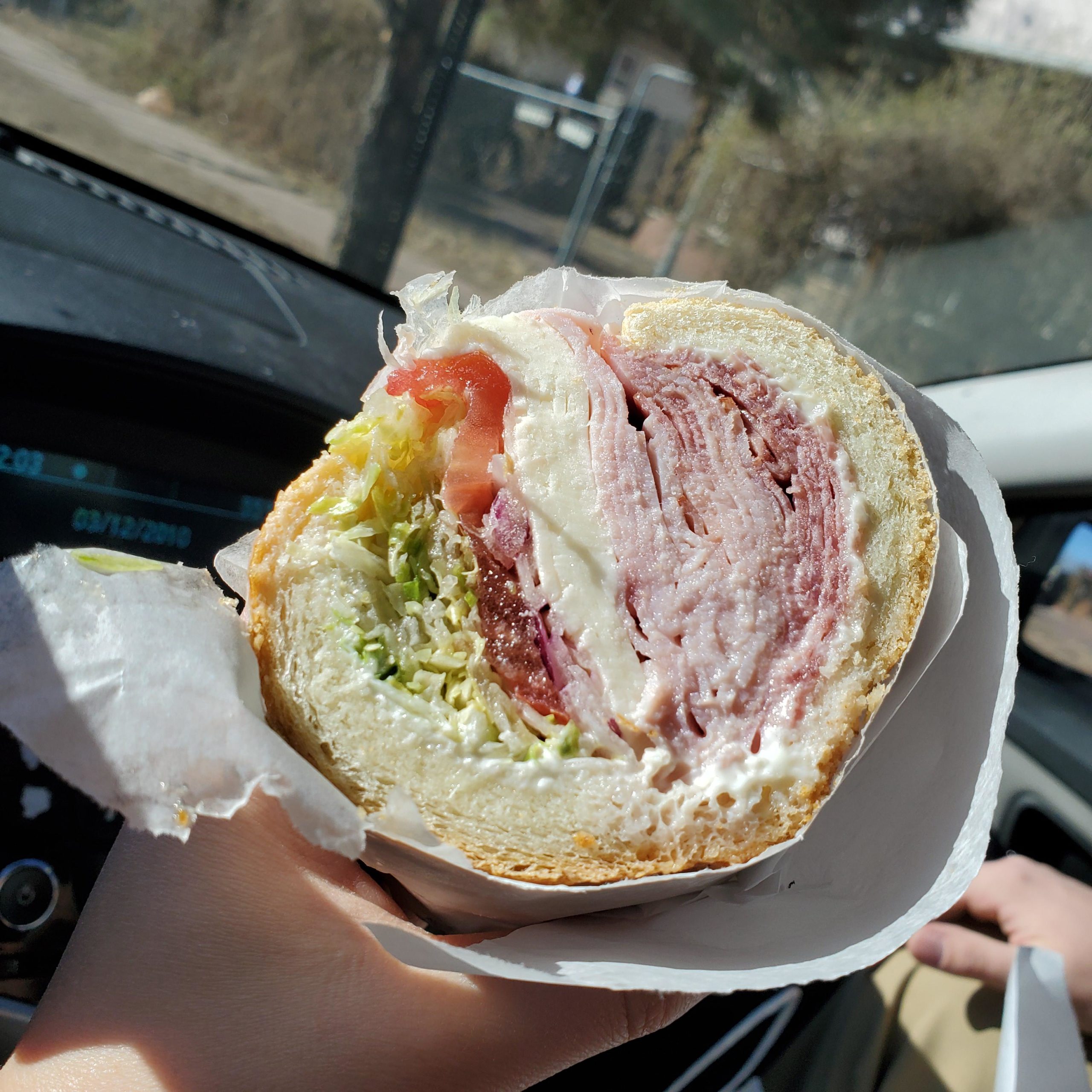 I ate a sandwich packed with salami, capicola, ham, Provolone, LTO
