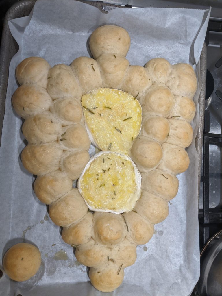 Mini dinner buns with double cream brie cheese baked at the same time. Yum