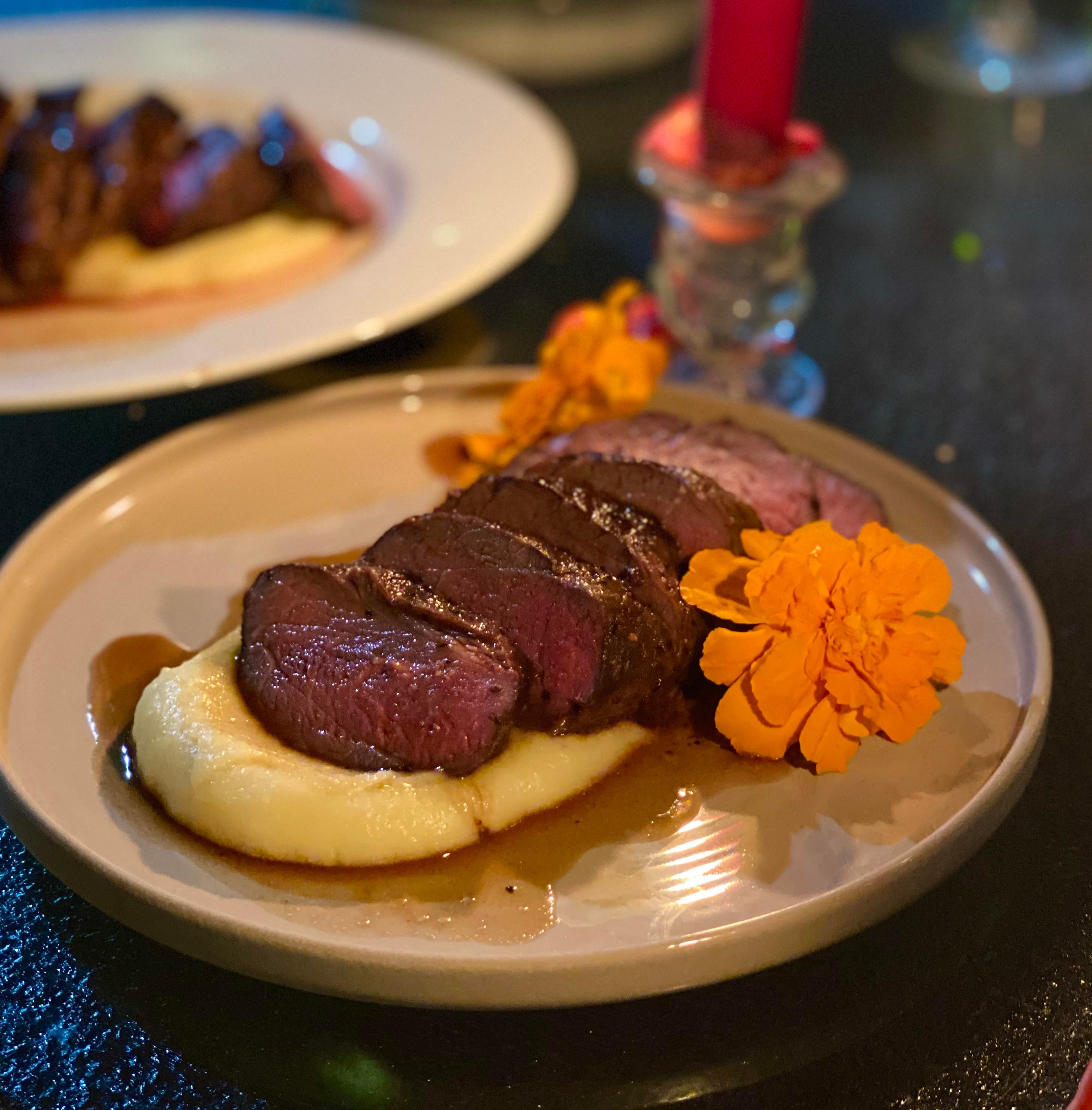 Sous vide Venison over yam purée topped with a Demiglacé. (2.5 hours