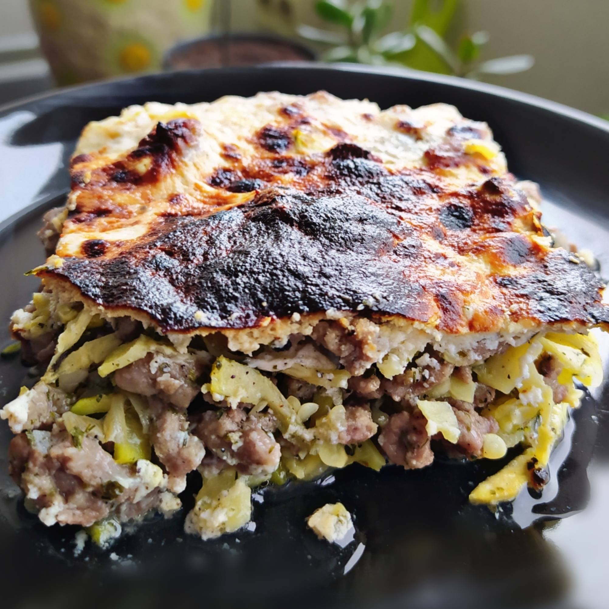Zucchini casserole with ground beef and yogurt sauce Dining and Cooking