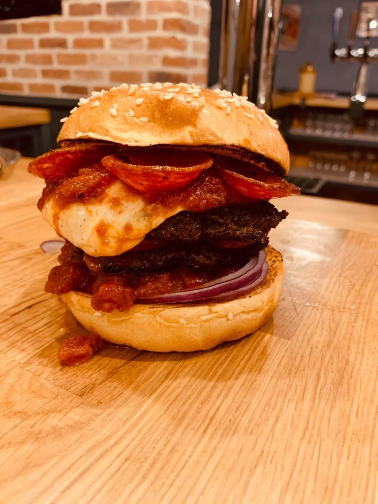 Burger I made at work, double smash patty, pepperoni, red onion, marinara sauce