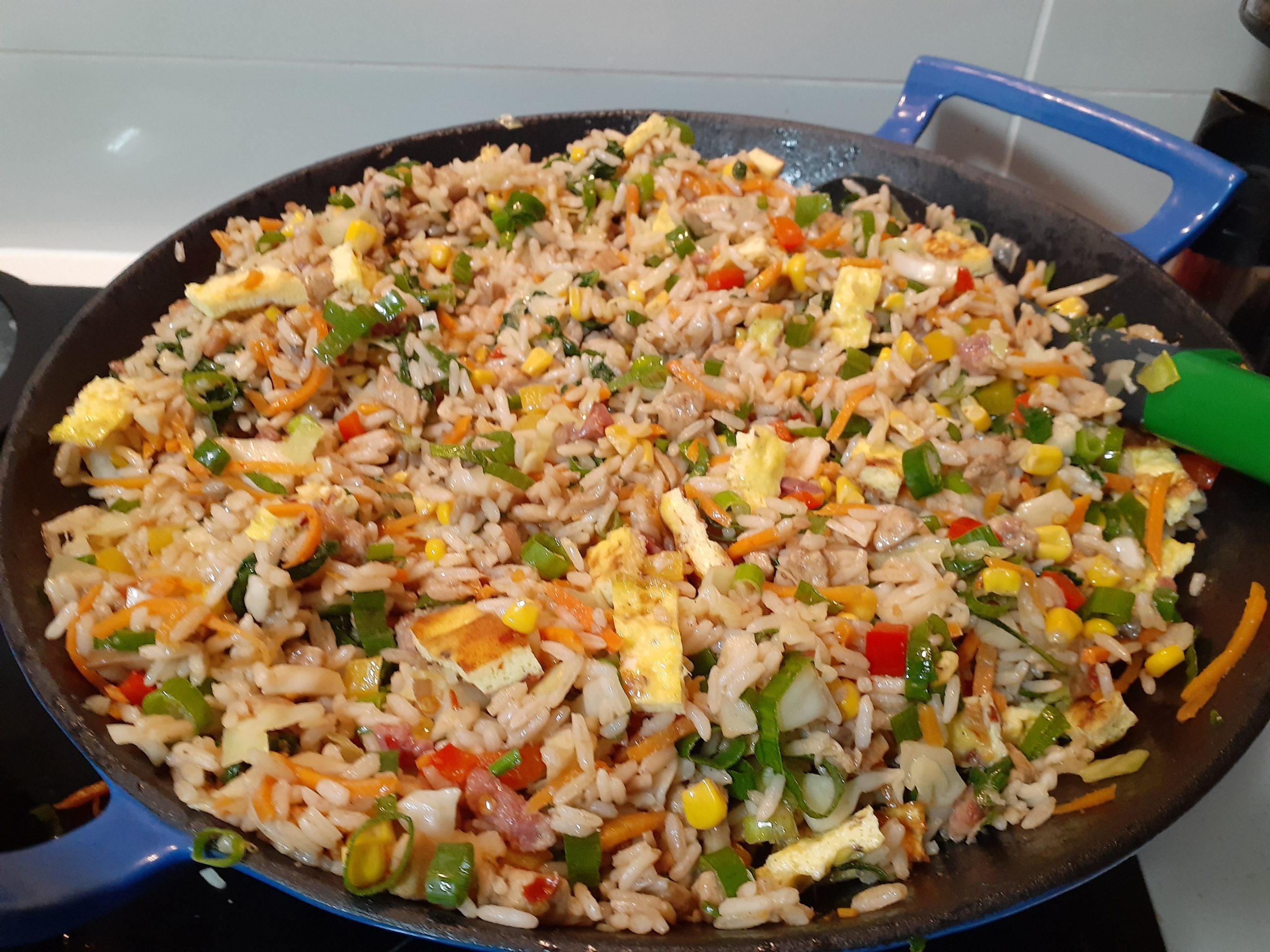 MauritianChinese chicken and bacon fried rice with a bunch of veggies