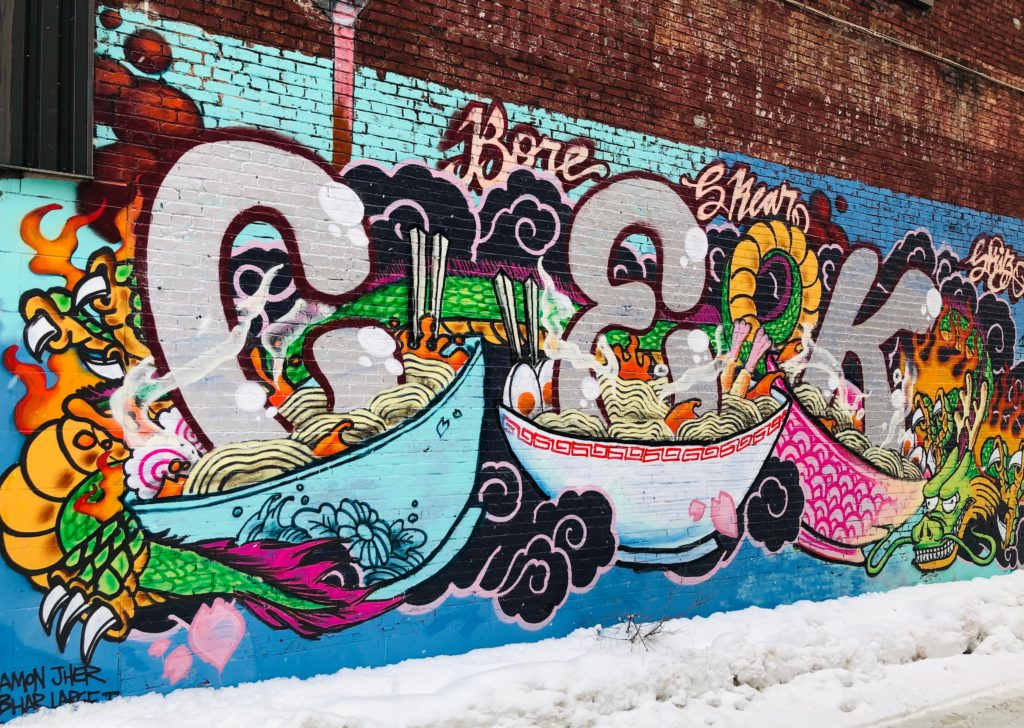 beautiful wall near me done by local artists! 🌚🍜🐉