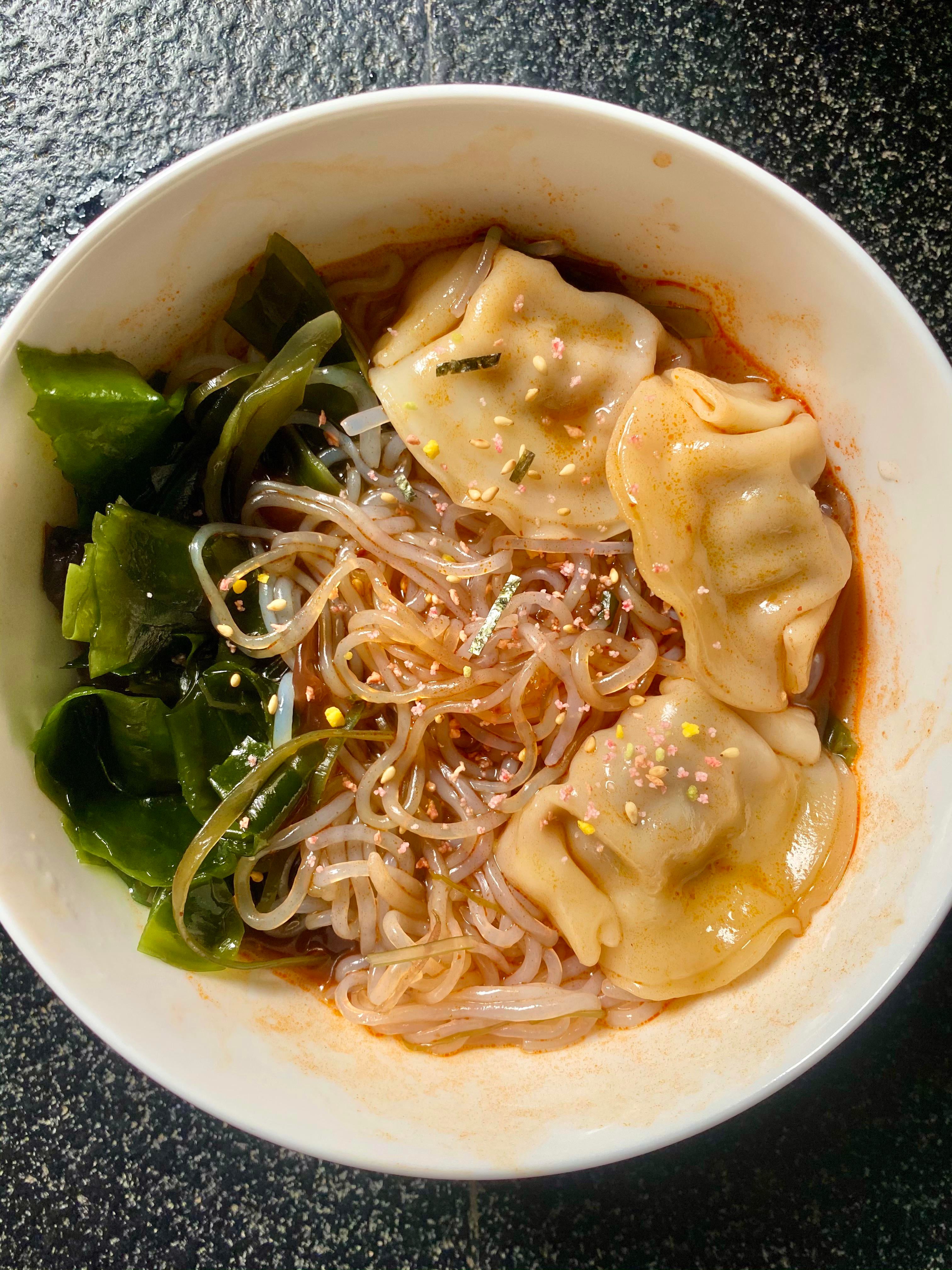 Konjac noodles with Japanese seaweed, dumplings & Korean hot chicken noodle sauce. Dining and