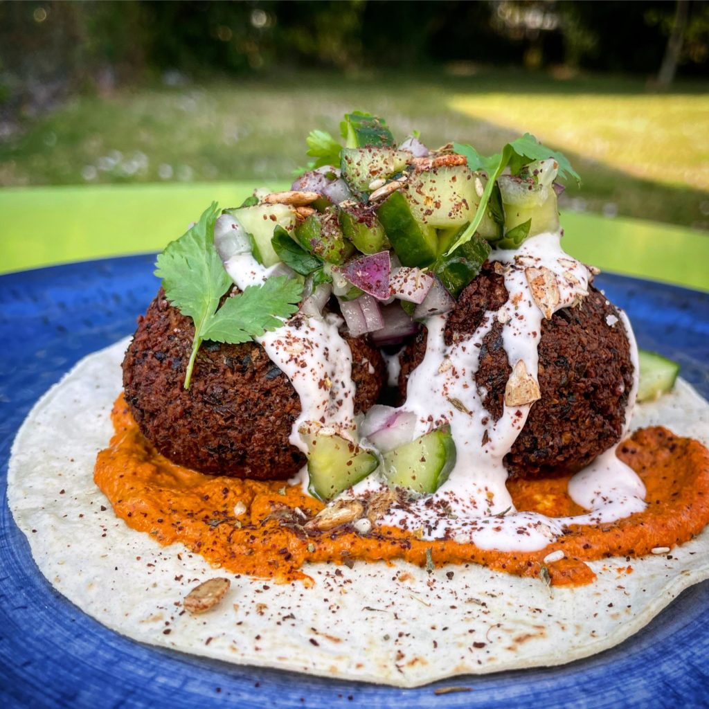 Falafel Taco. Tahini pipian, sumac crema, cucumber pico and Za’atar.