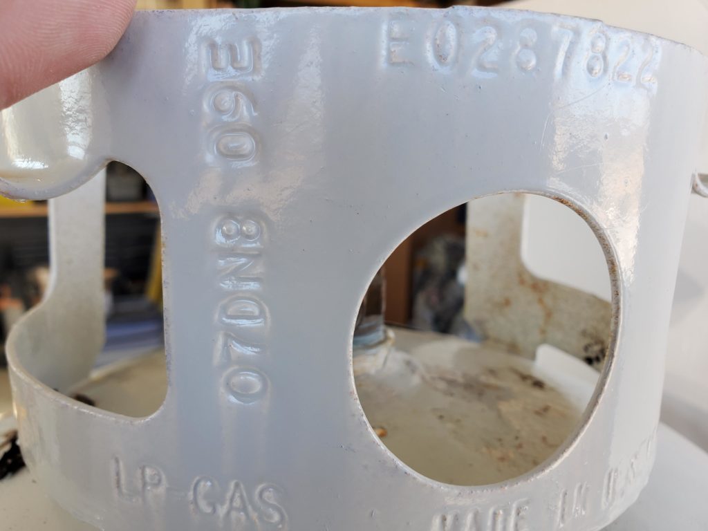 How do I read these markings on a20lb propane tank? Is it expired?