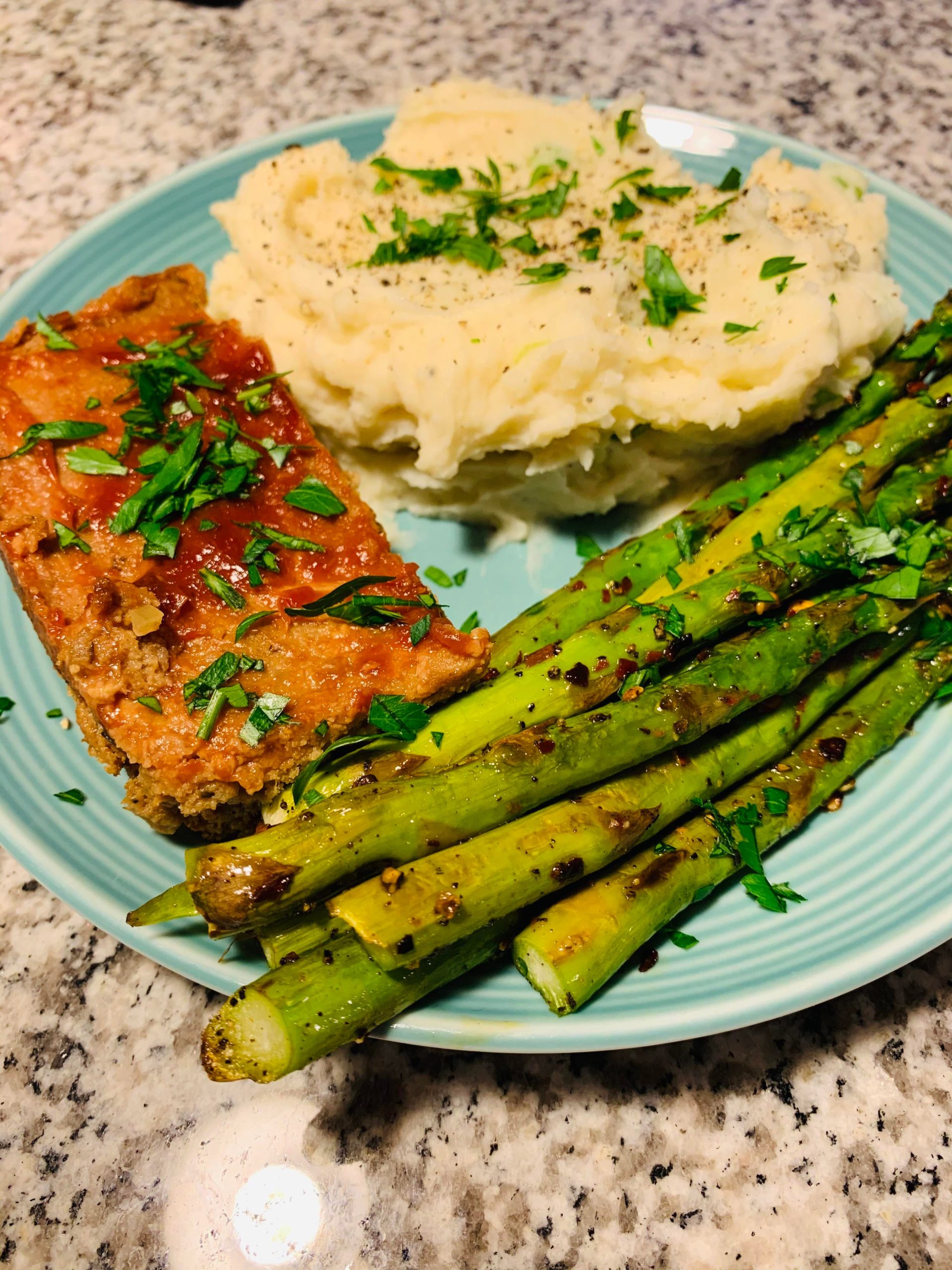 Turkey meatloaf, mashed potatoes, and asparagus for 619 cals and 28 g