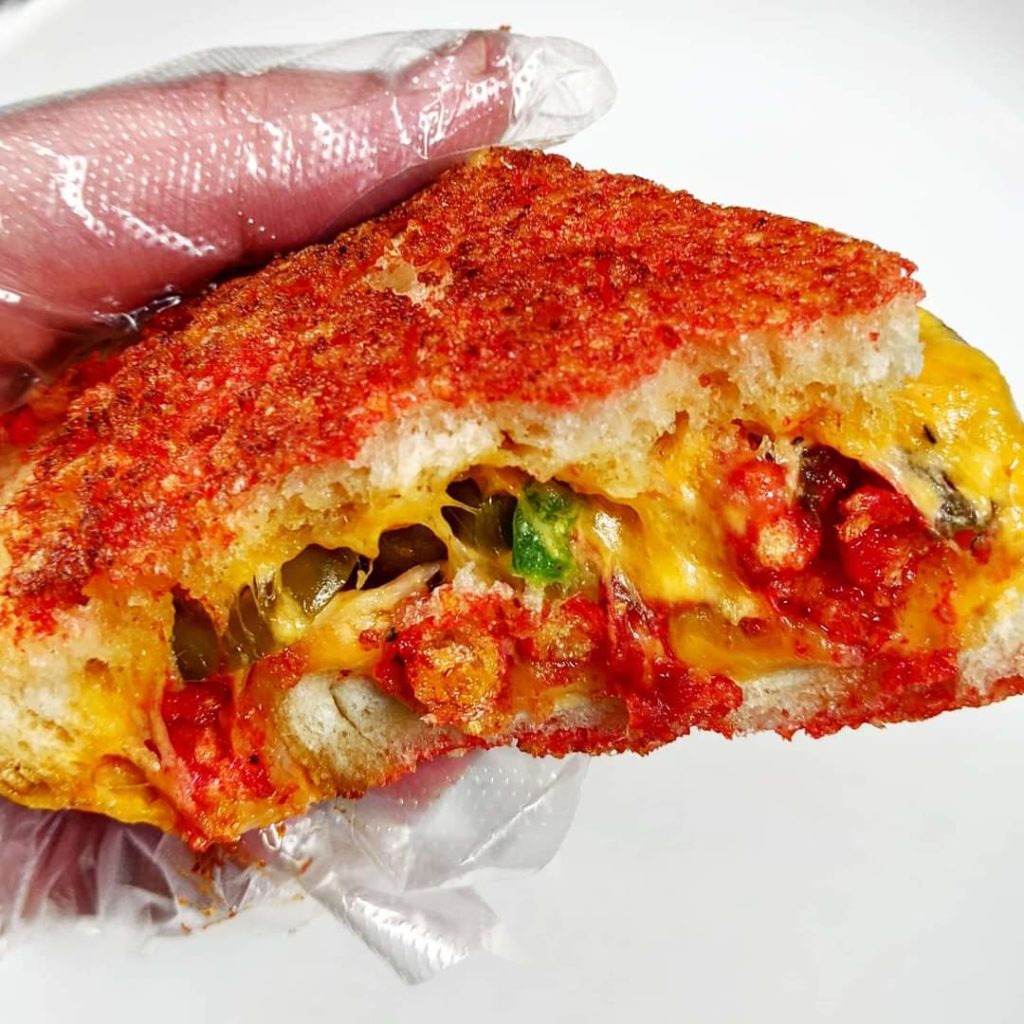 Hot cheeto crusted grilled cheese with pickled jalapenos