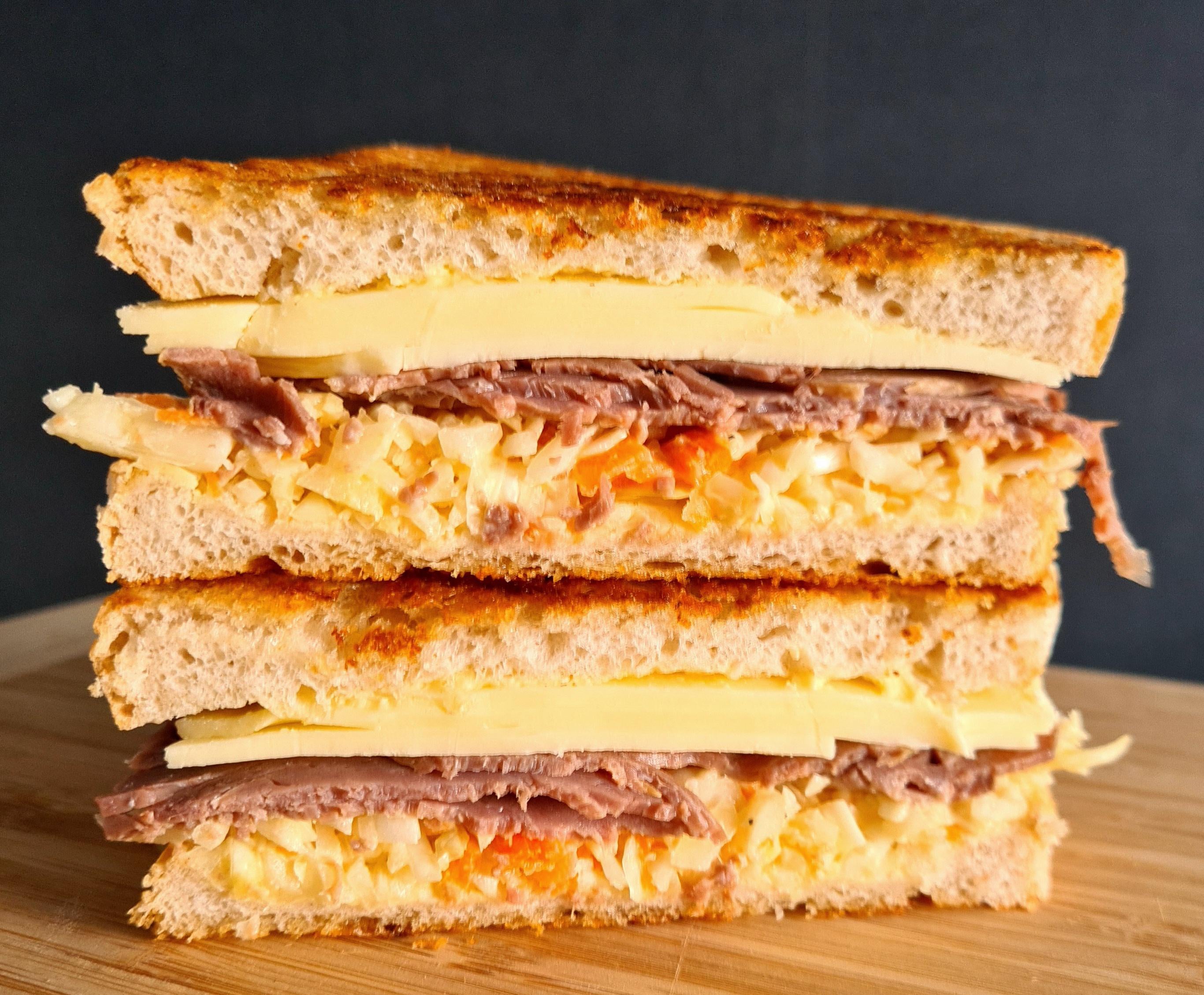 Roast beef, gouda, coleslaw, on toasted sourdough. Dining and Cooking