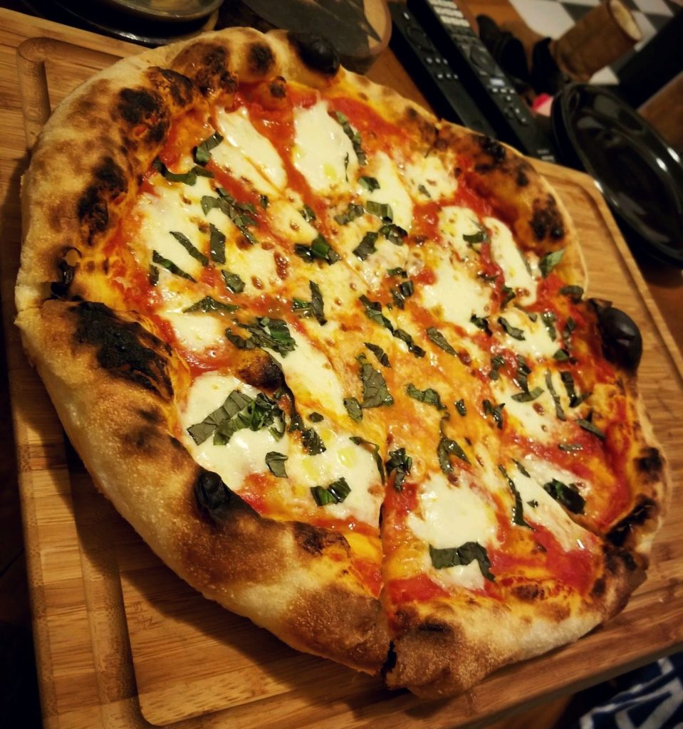 Used the lodge pizza pan (cast iron). Much better than a stone