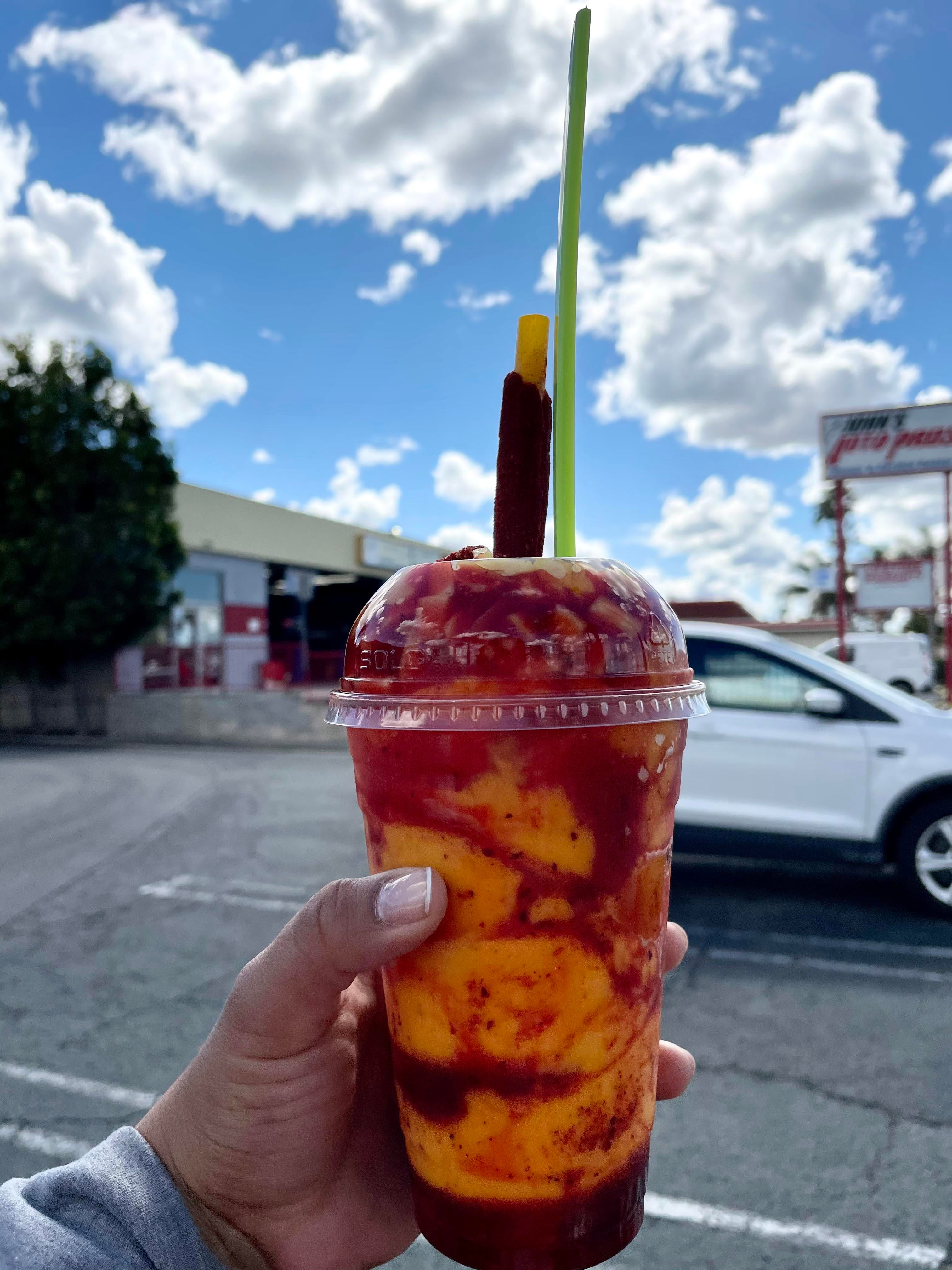 Stopped and got this Chamango! Mango ice cream, chamoy, Tajin, and