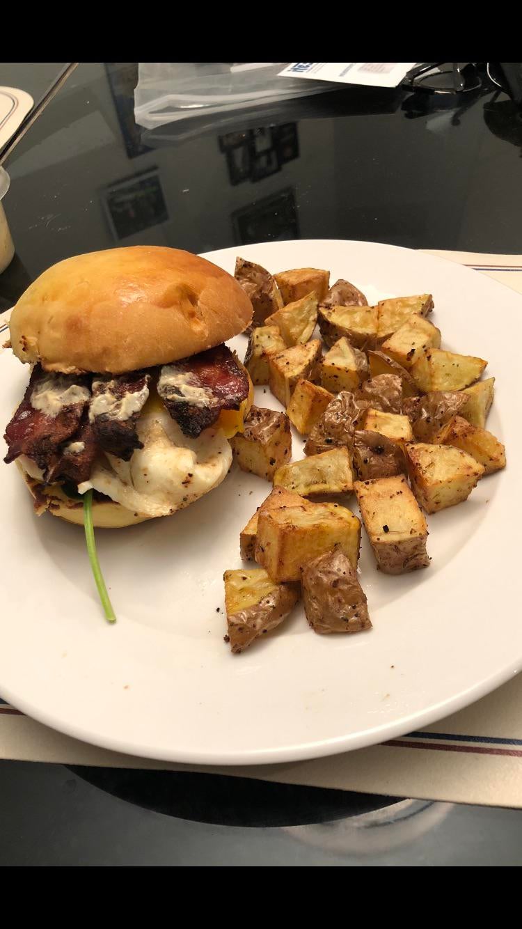 Bacon and egg on homemade brioche buns with fried potatoes Dining and Cooking