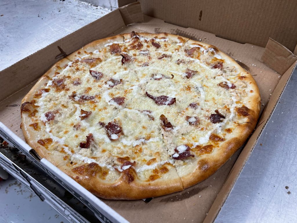 Hands in the air for the “Green Wave”