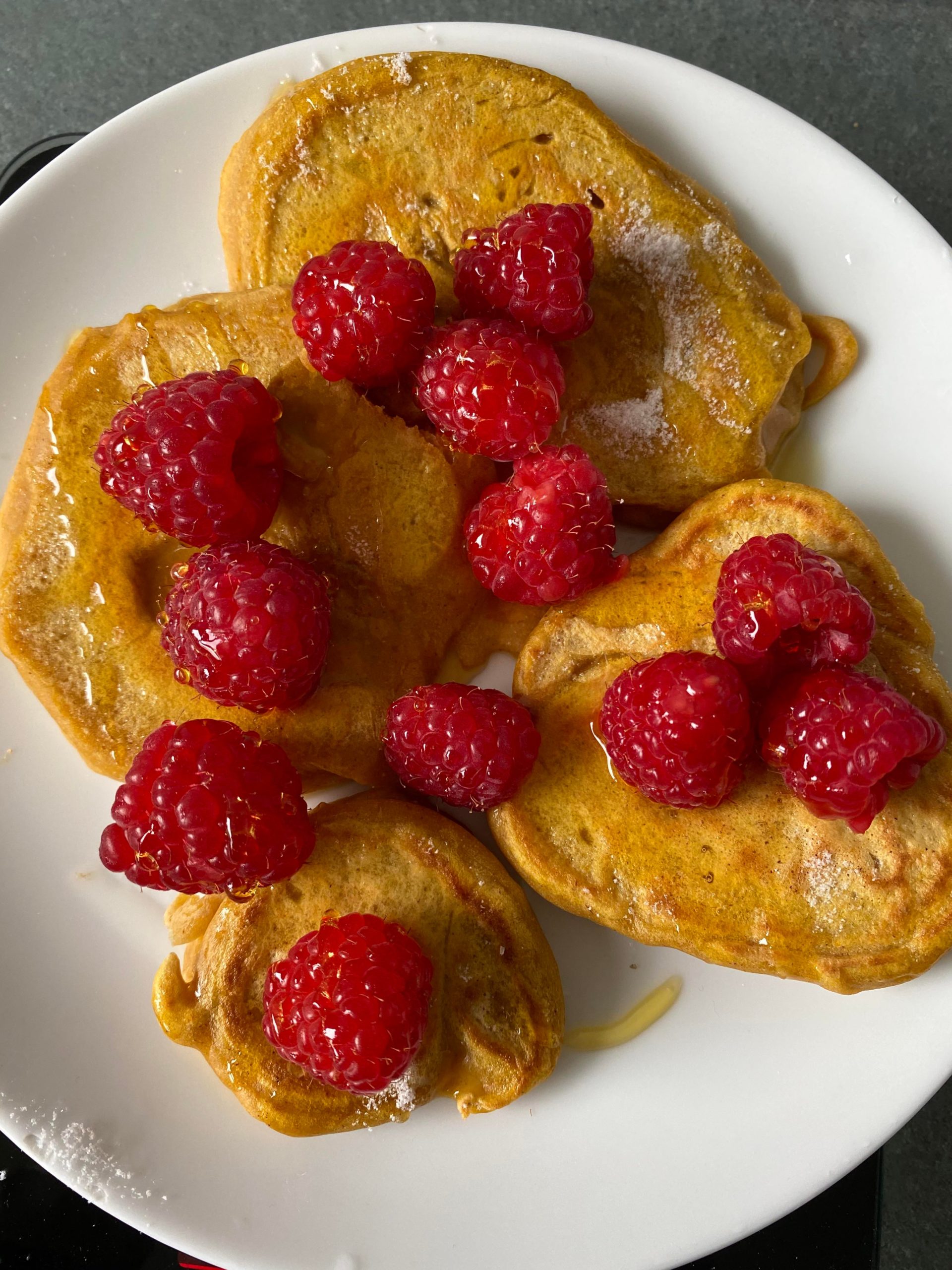 Pancakes for 309 calories without the syrup and raspberries. 413 with