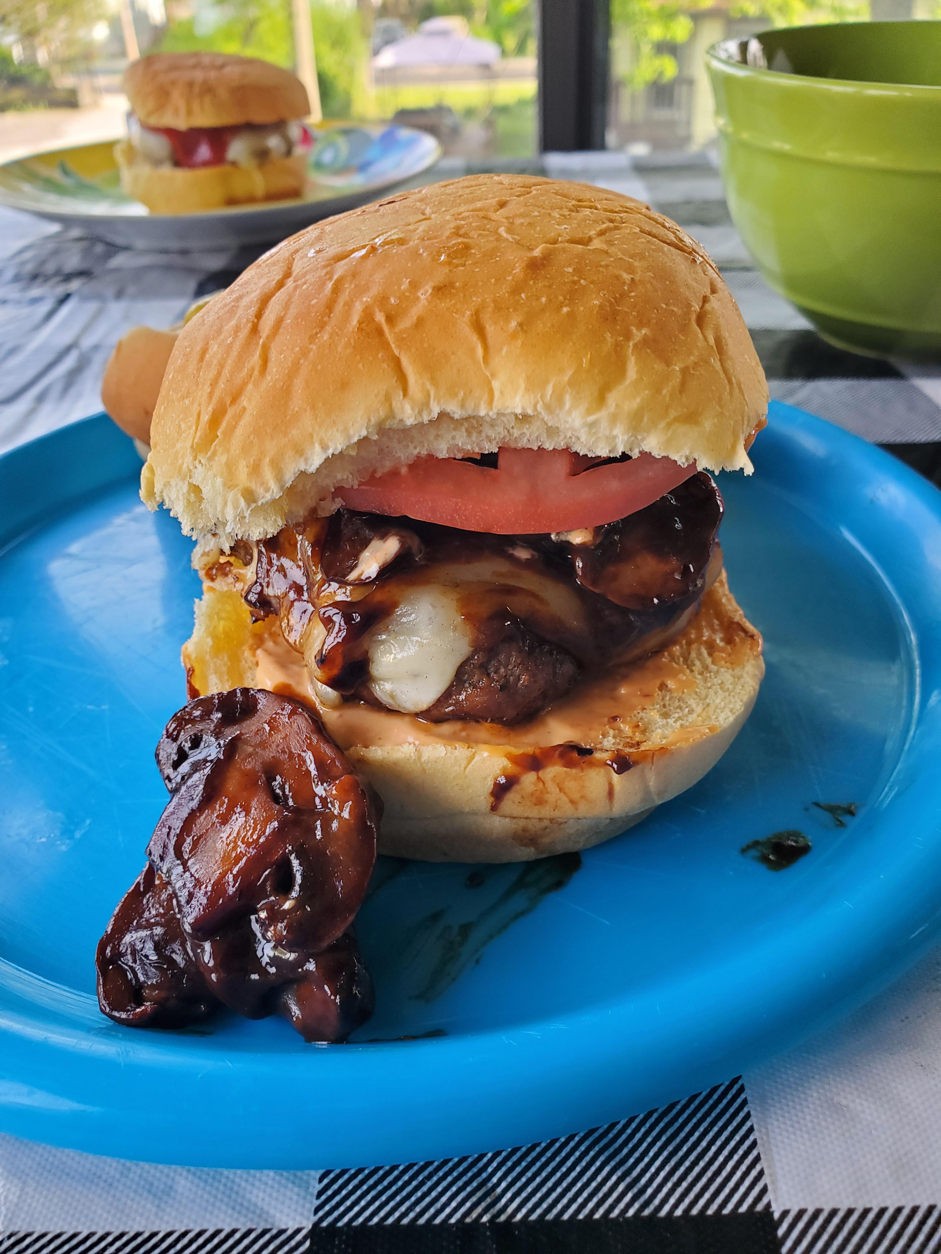 Beef and sausage burger with pepper jack, gravy soaked mushrooms, and chipotle mayo Dining and