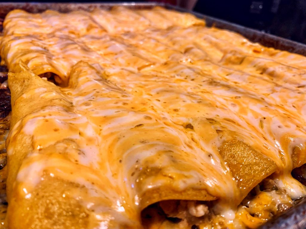 Green Chili Chicken Cheese Enchiladas