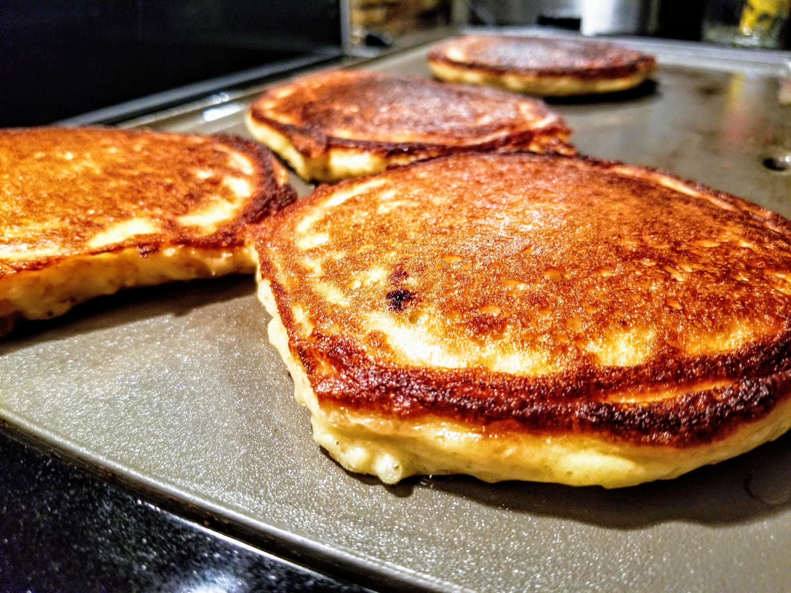 Pancakes cooked on griddle, crispy edges! Dining and Cooking