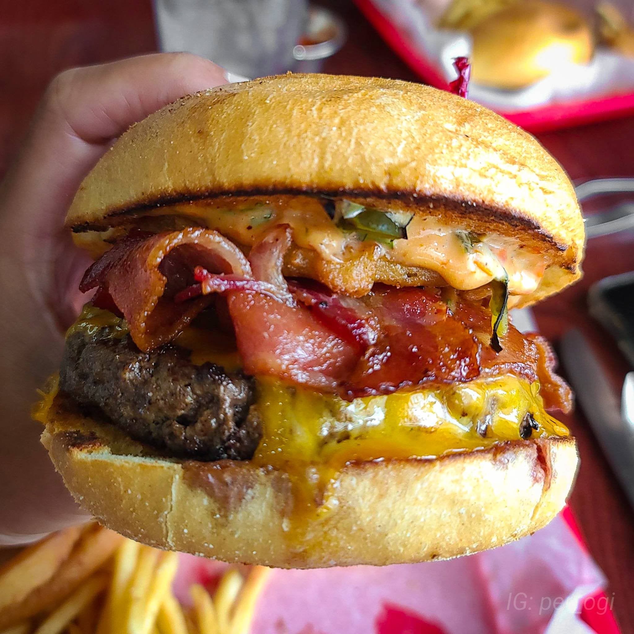 Burger Tuesday w/ Blackened tomato aioli, cheddar, grilled jalapeños