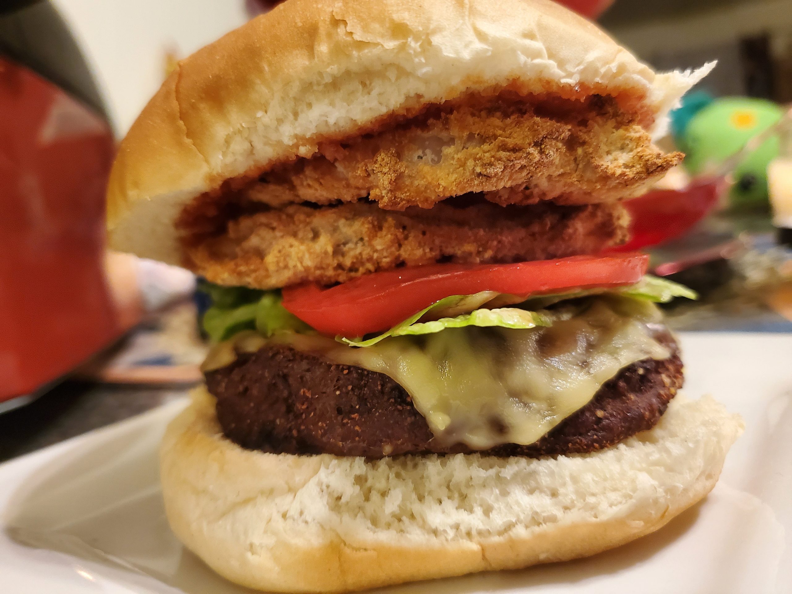 Impossible patty with smoked gouda style cheese, lettuce, home grown