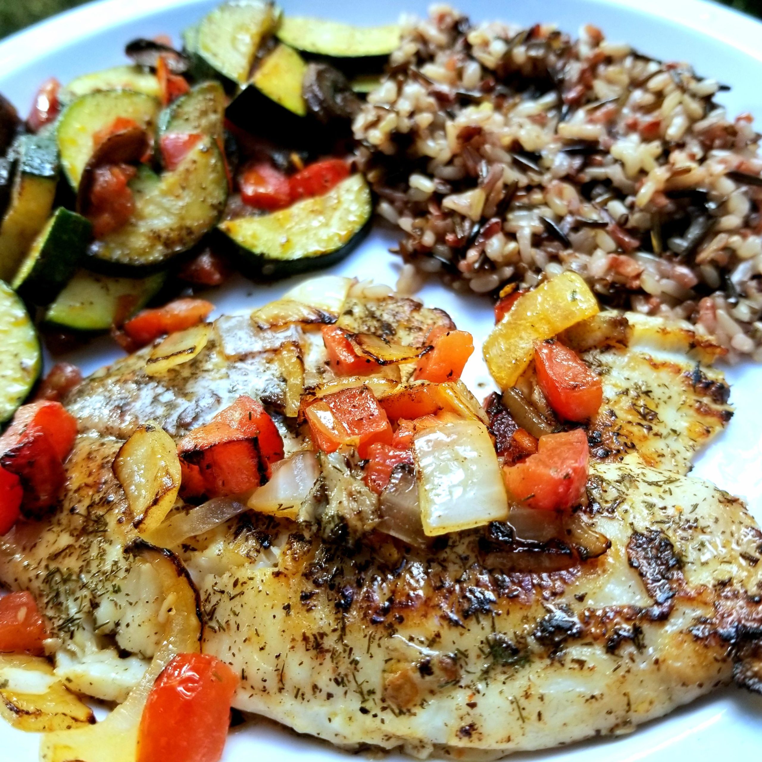 Tilapia, wild rice, and zucchini, all cooked on my 1947 Coleman camp
