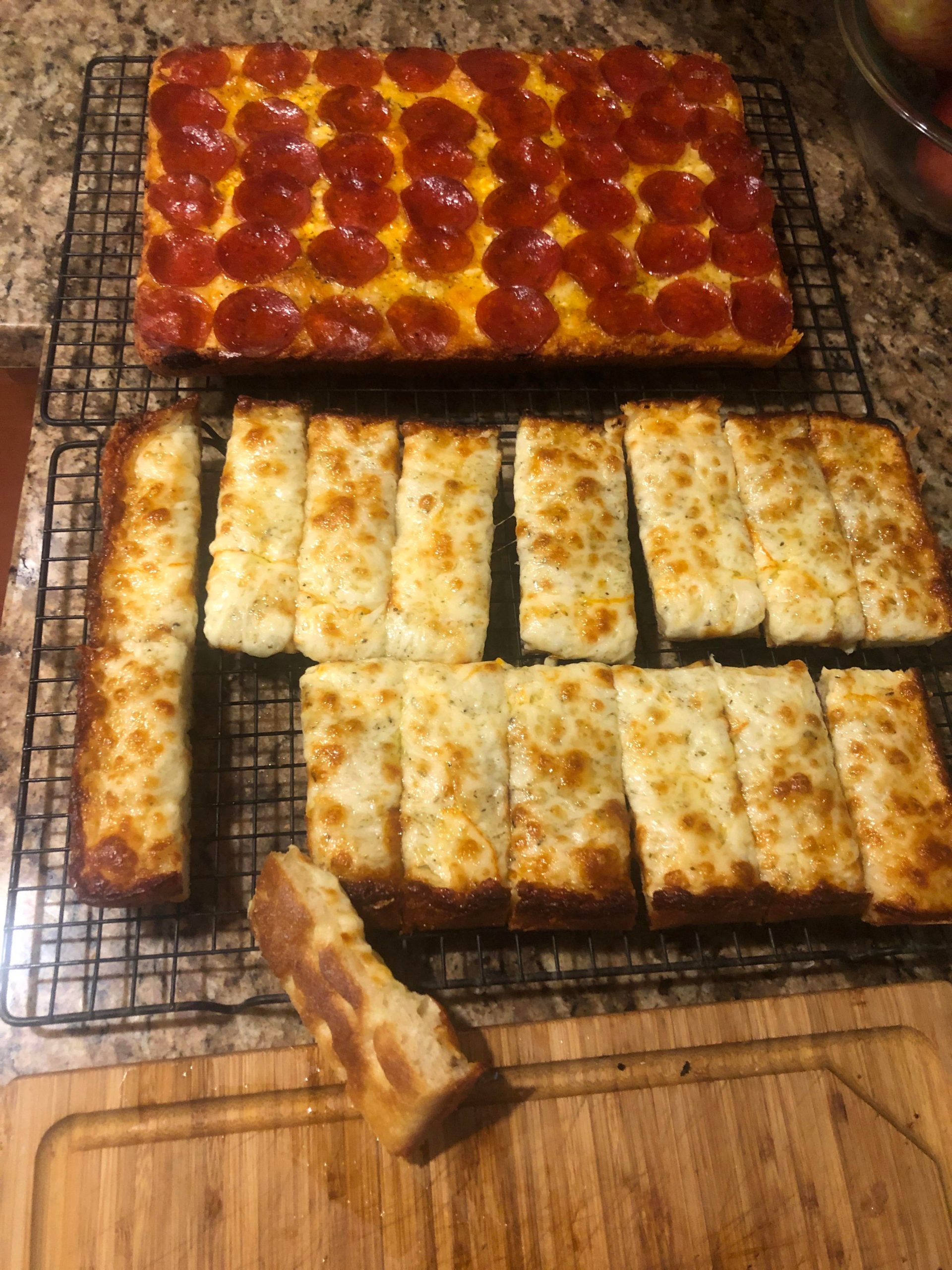 Detroit style pizza and garlic cheese bread. Awesome crunch. Dining
