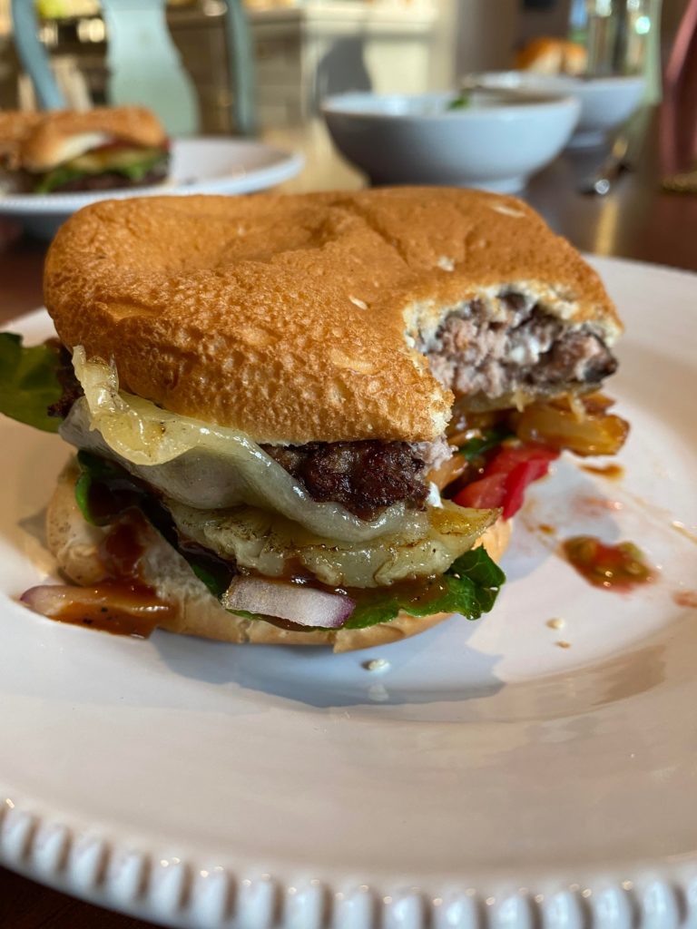 Am I the only one that turns their burger upside down after the first bite when they eat it?