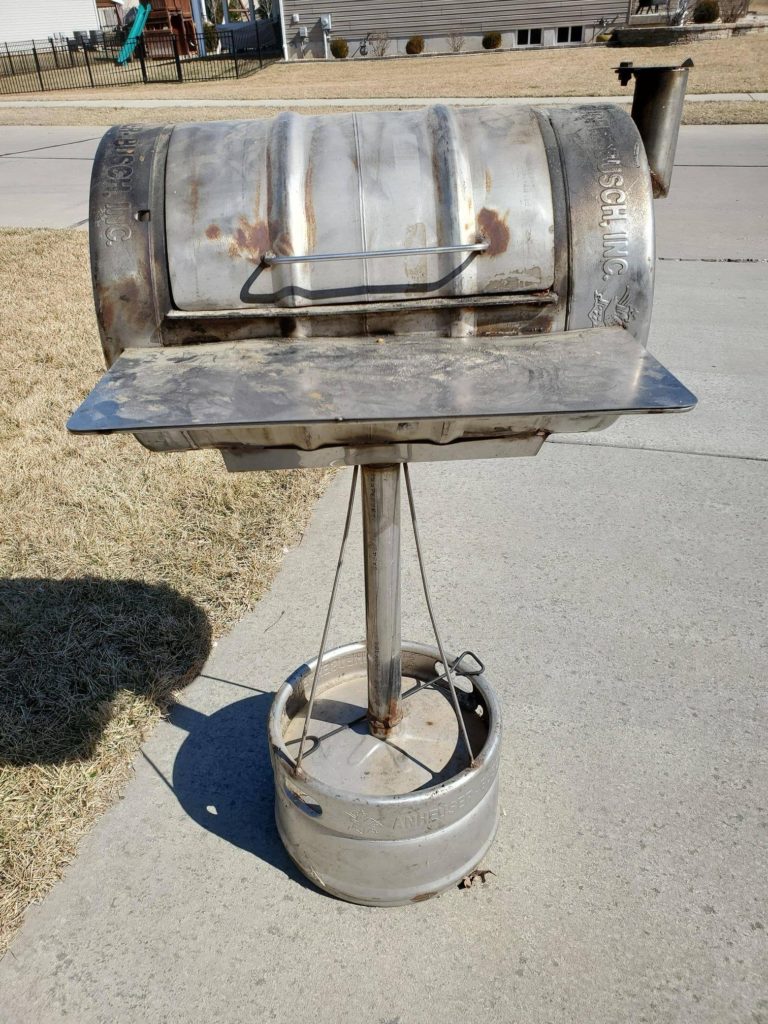 My custom charcoal keg grill/smoker. Even the base is a pony keg. She's gotten a lot of use over the years.