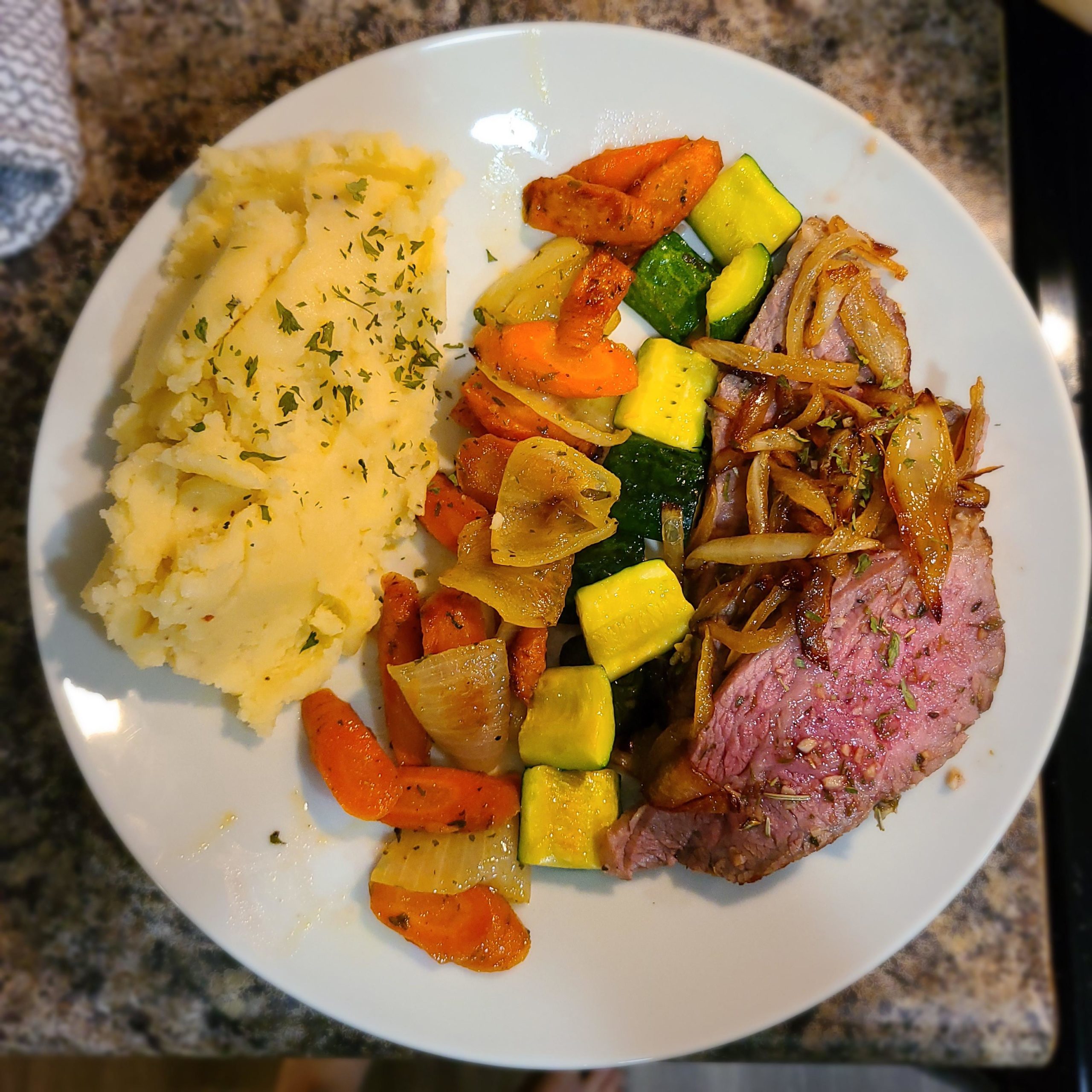 Tritip roast, honey roasted carrots, zucchini, and cheesy mash