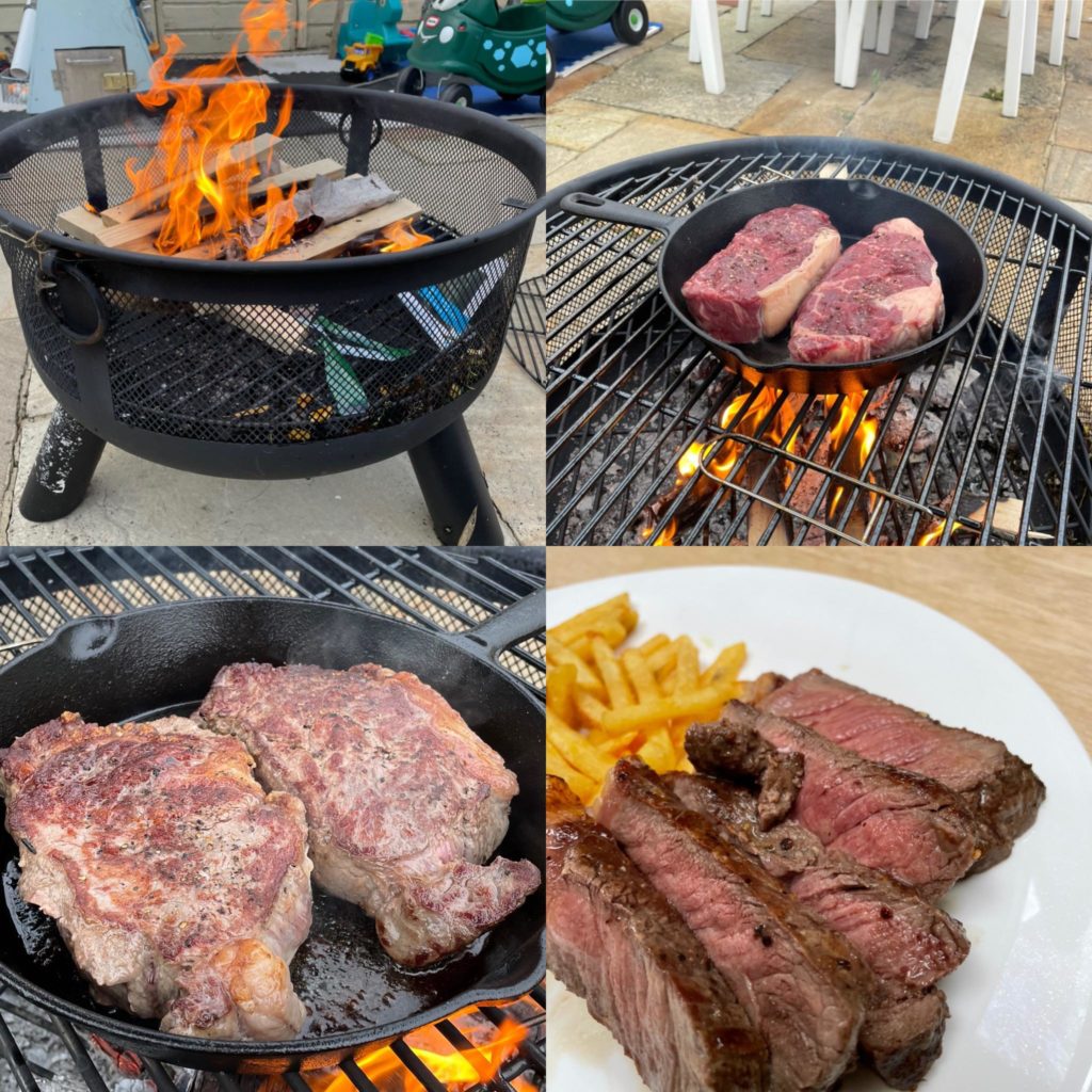 Cast iron over fire pit thick ribeye
