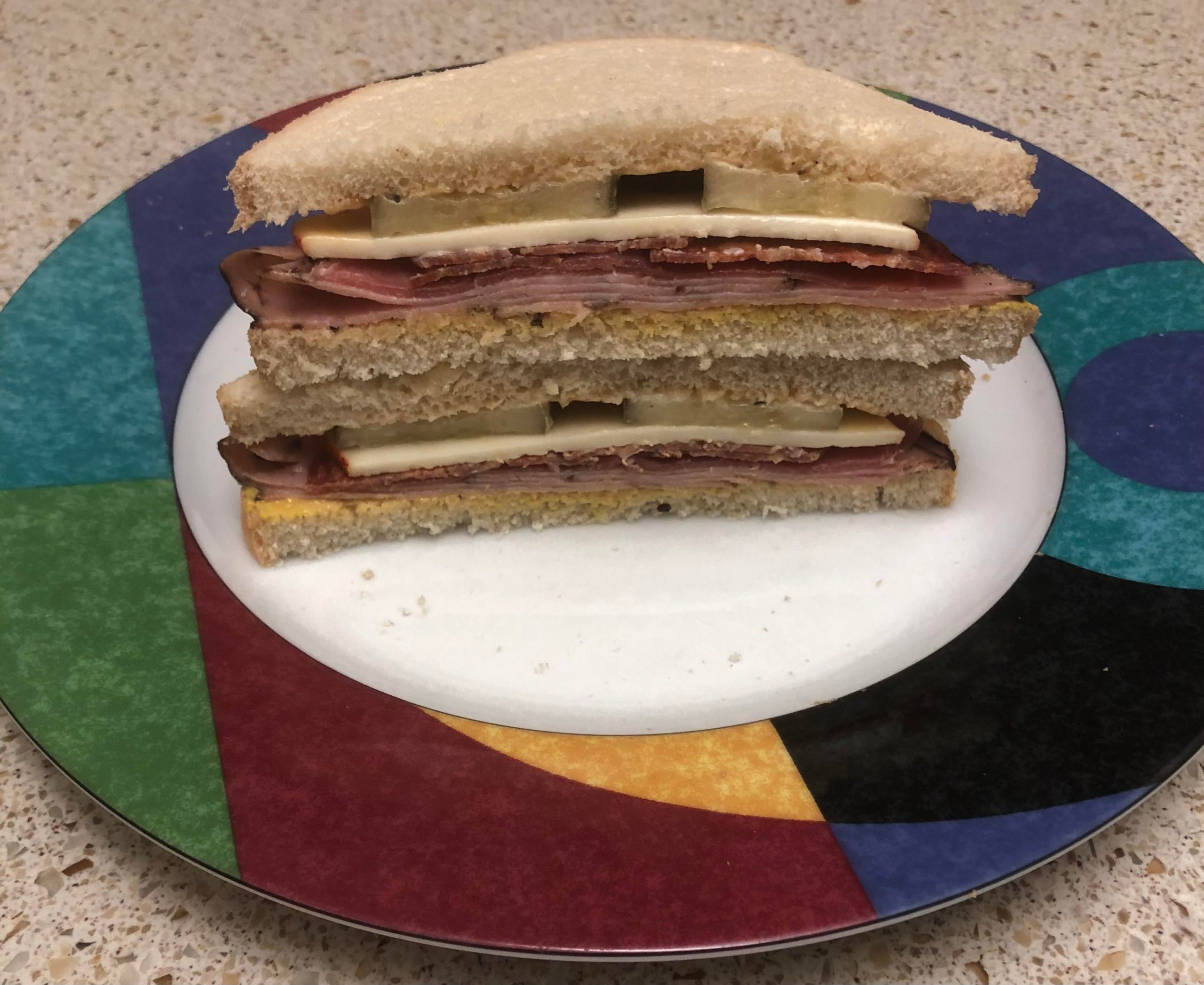 Black Forest ham, prosciutto, pepperoni, Muenster cheese, and pickles