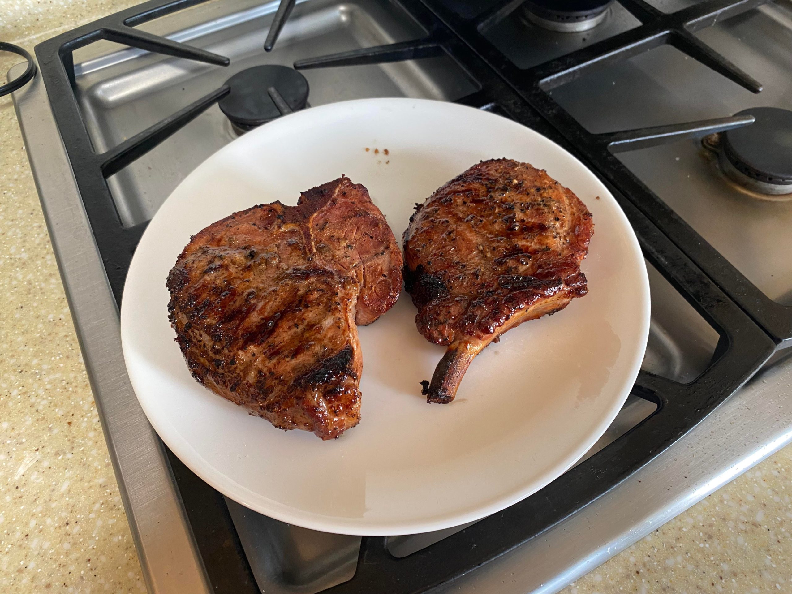 Pork porterhouse and bonein pork chop. Dining and Cooking