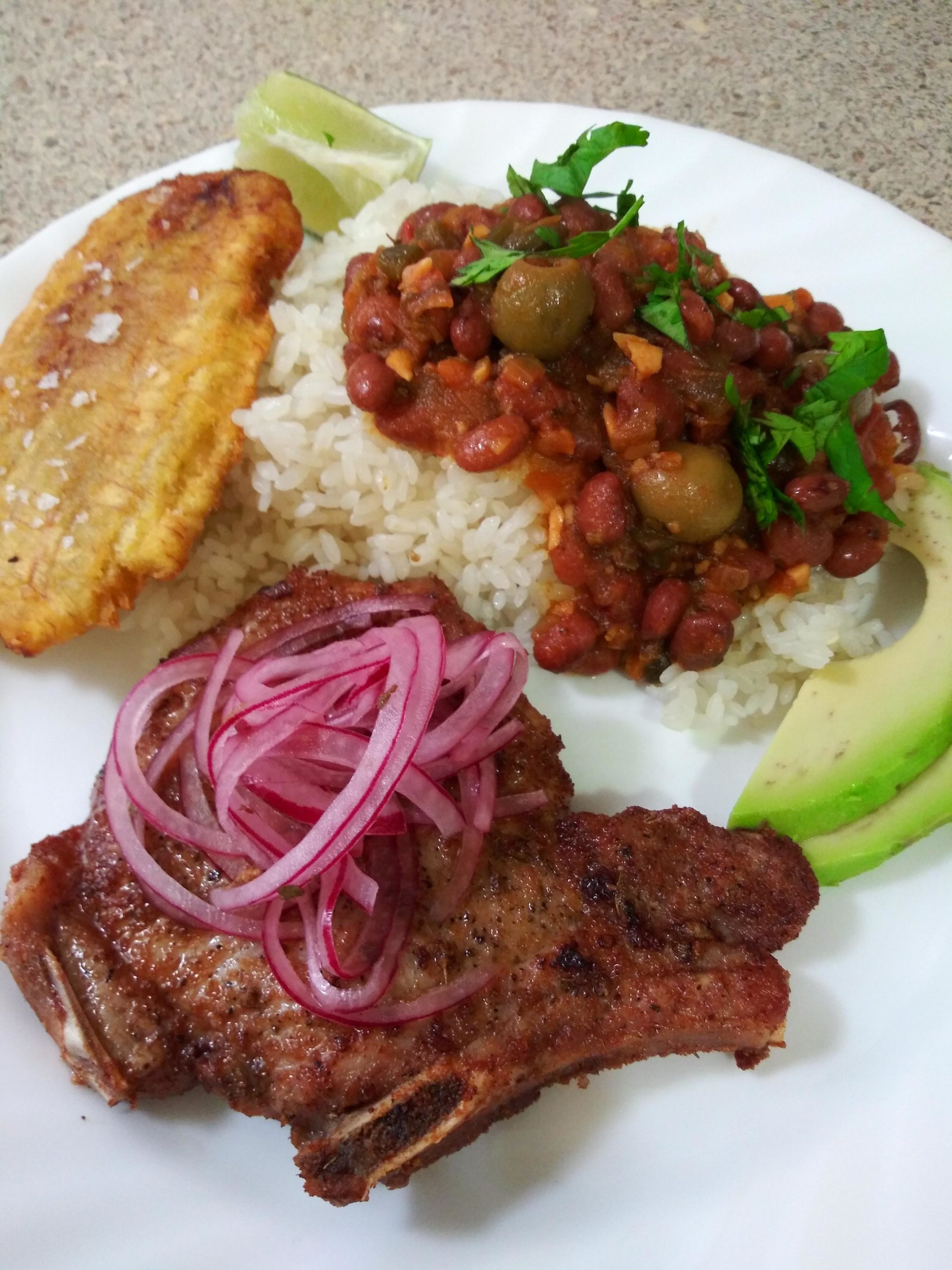 Puerto RicanStyle Fried Pork Chops with Stewed Beans, Fried Plantains
