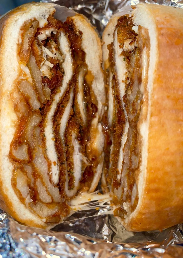 The “Heart Attack” Sandwich which consists of Chicken Cutlet, Melted Mozzarella, Spicy French Fries, Onion Ring, Bacon and Special Sauce… Would you eat?