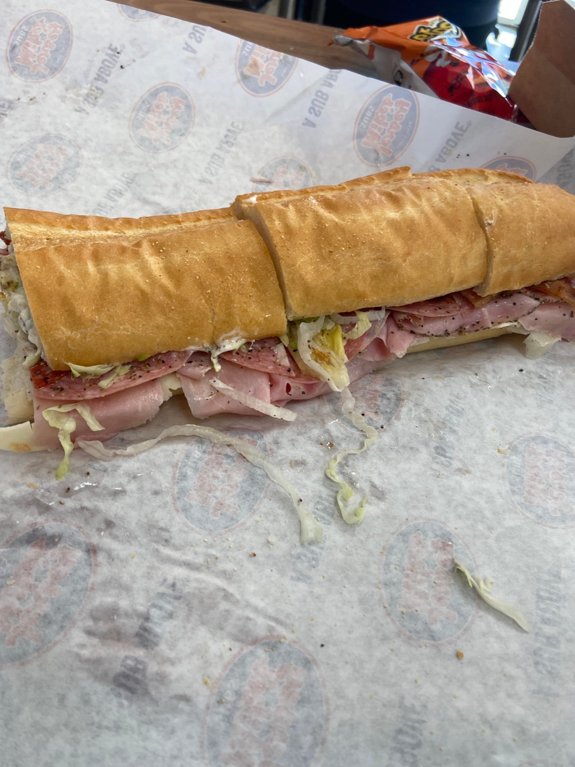 Jersey Mike’s Italian sub with bacon, mayo, and spicy mustard Dining