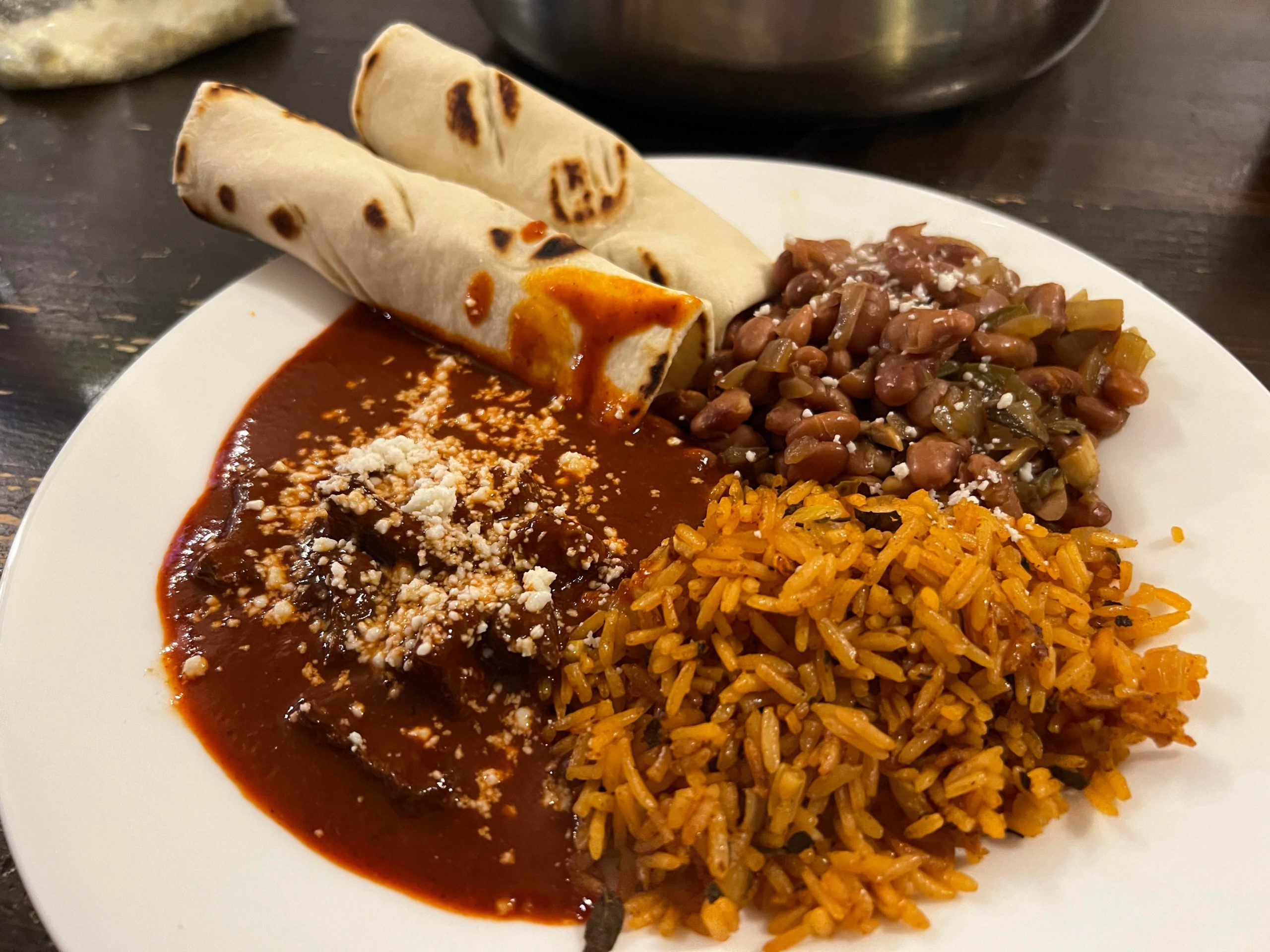 Chile Colorado, Mexican rice, borracho beans and fresh made tortillas ...