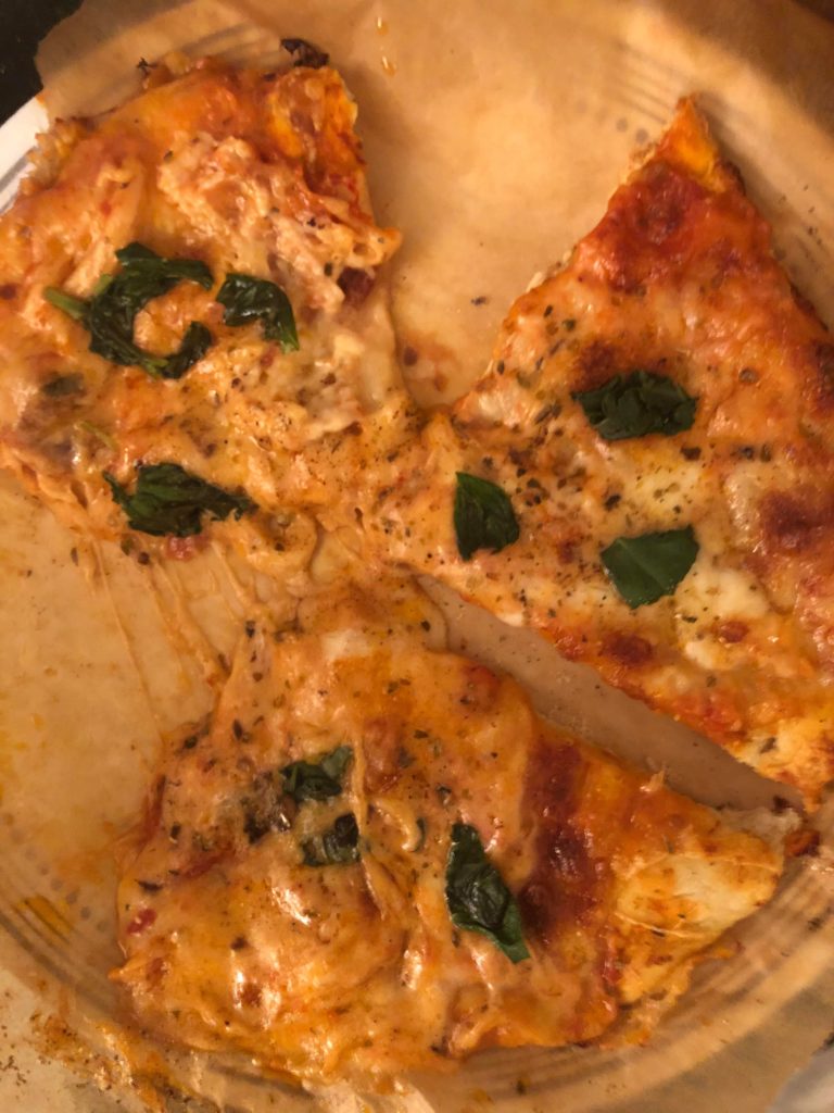 Homemade extra cheese pizza made with homemade naan dough