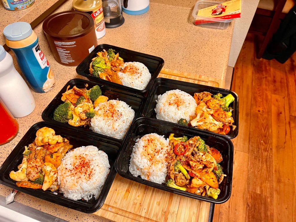 Sichuan style “dry pot” chicken with steamed rice and homemade chili oil
