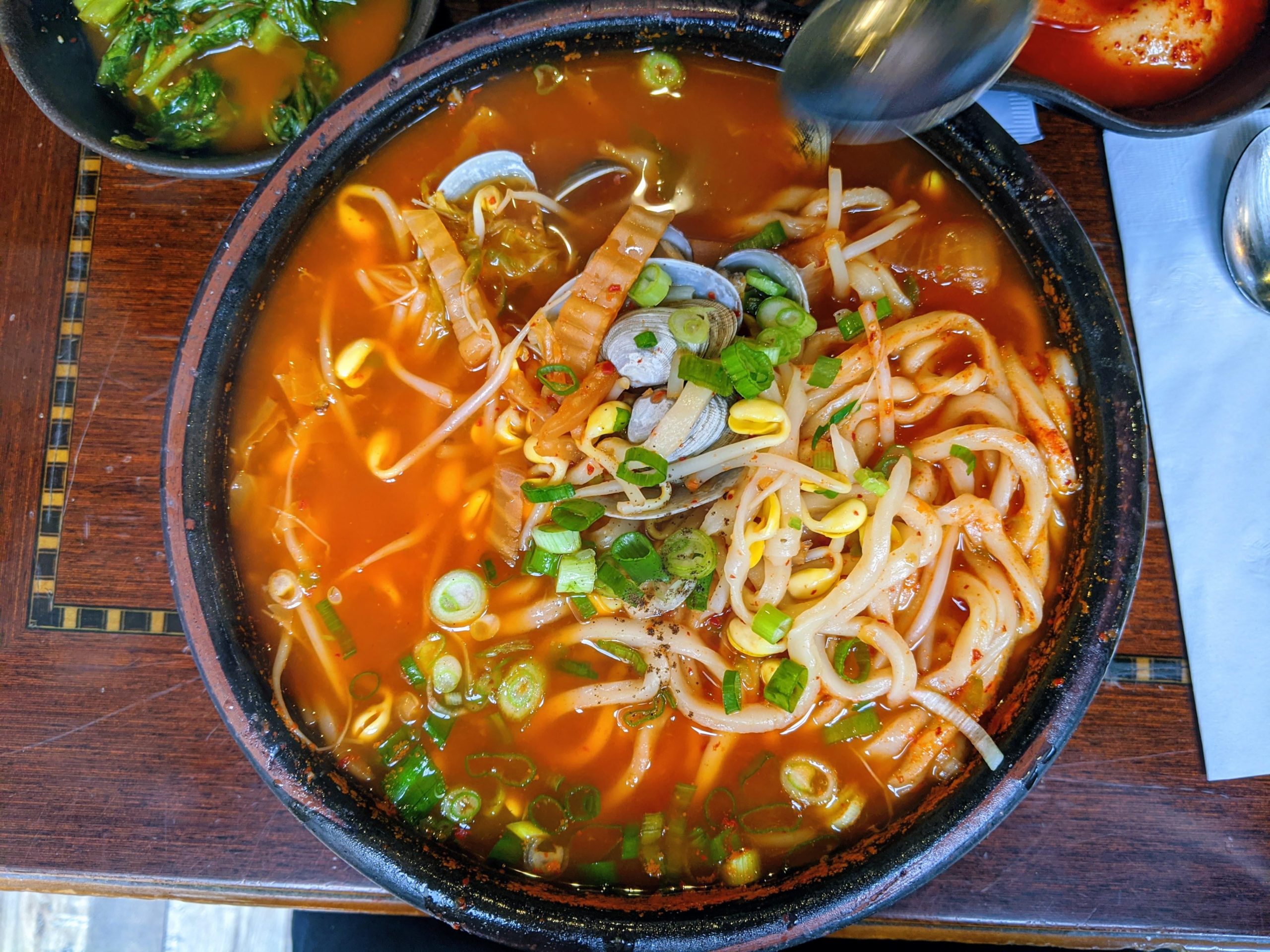 Spicy seafood knifecut noodles (칼국수) Dining and Cooking