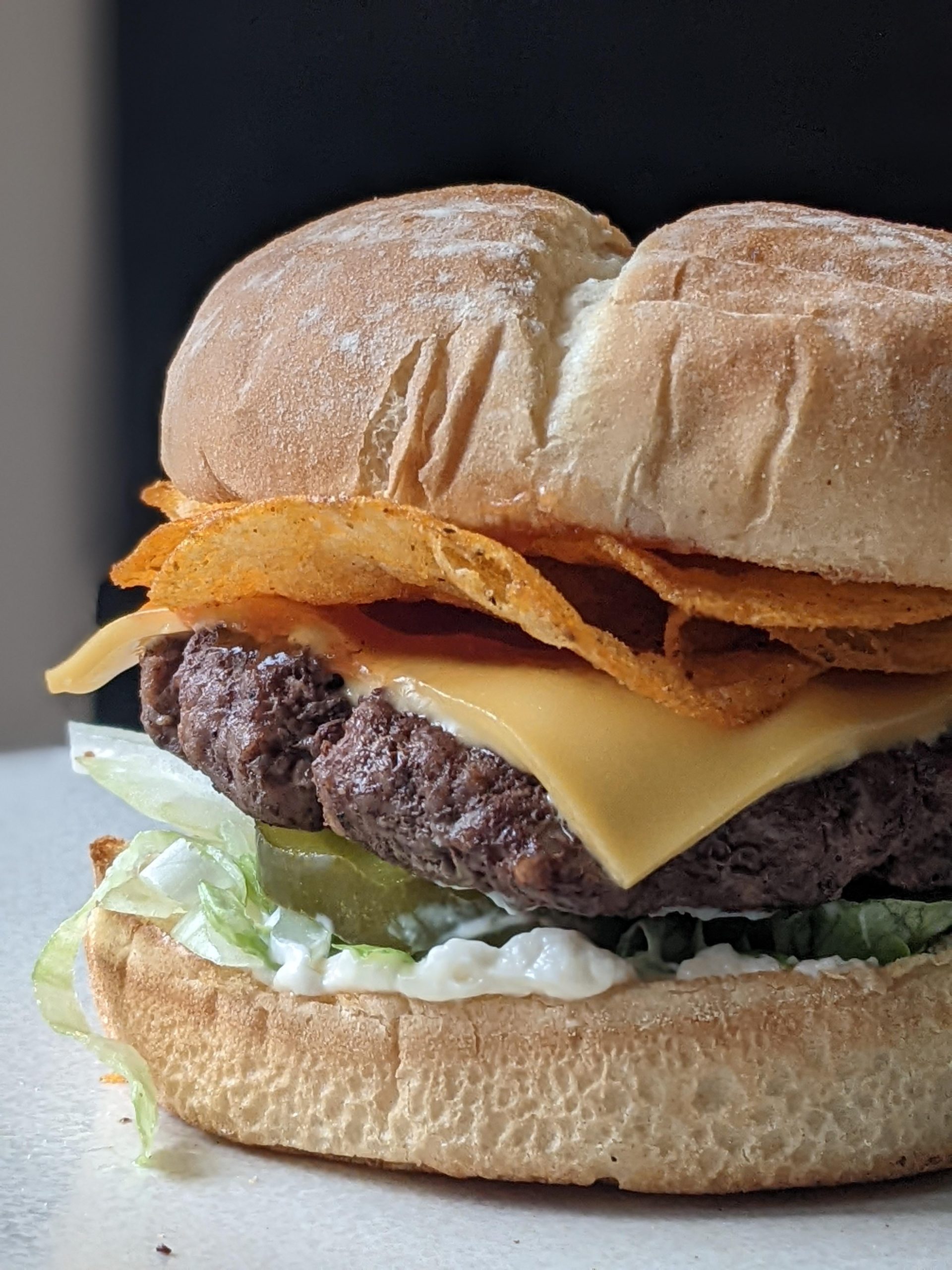 Floury bakery style bun, mayo, ketchup, onion, shredded iceberg, pickle