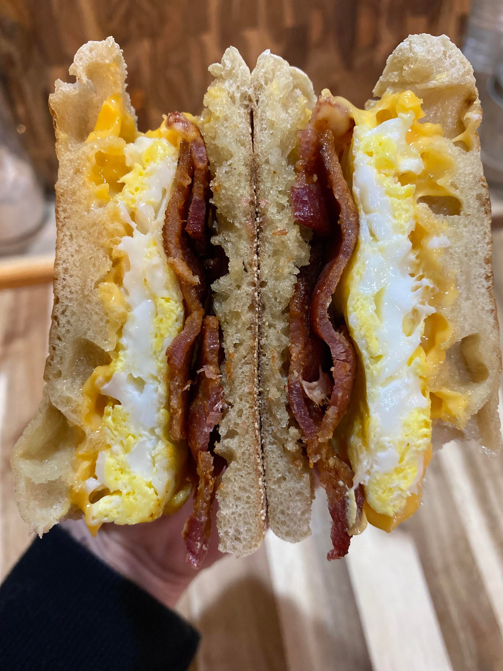 Classic breakfast sandwich. Thick bacon, egg, and cheese, on buttered