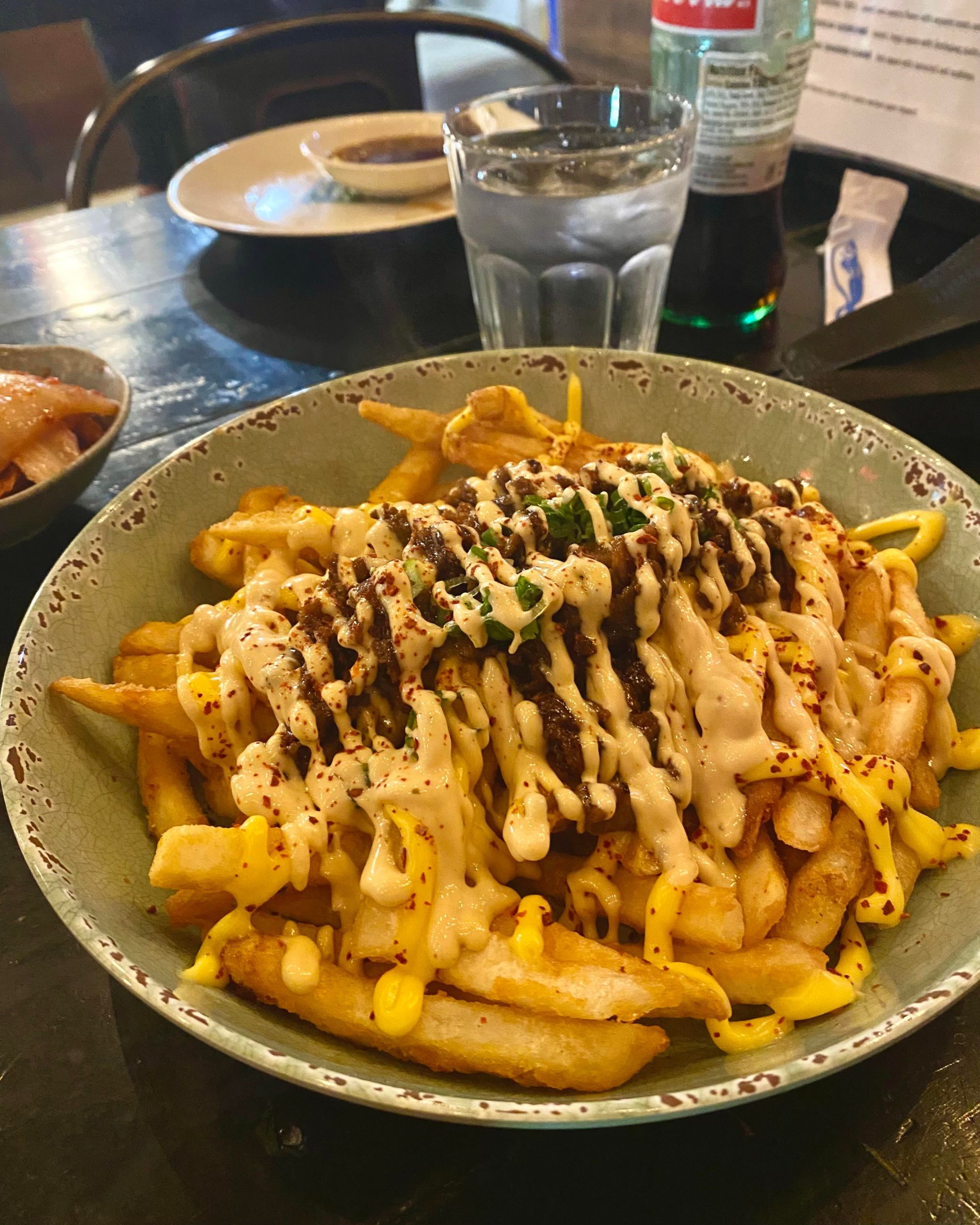 Bulgogi loaded fries with queso, jalapeño, and spicy mayo Dining and