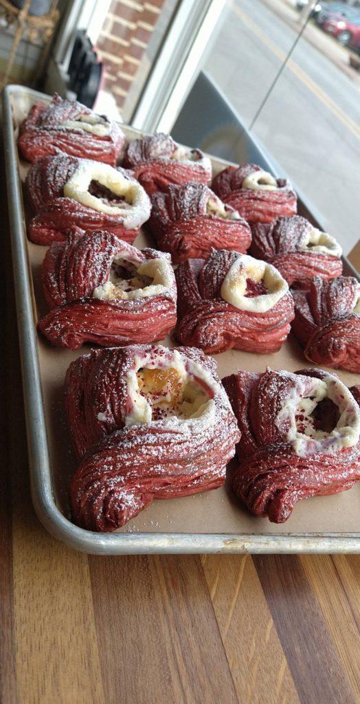 Red velvet croissant pastry with a sweetened cream cheese filling
