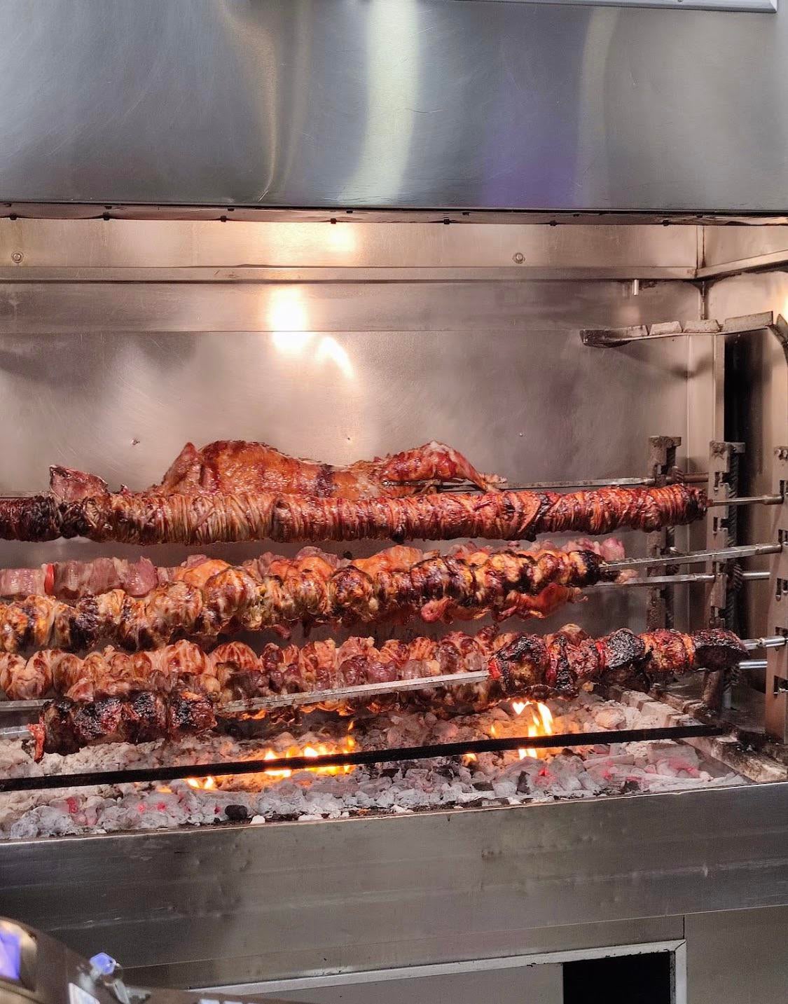 How we grill in Greece. Whole lamb, pork and chicken kabobs and