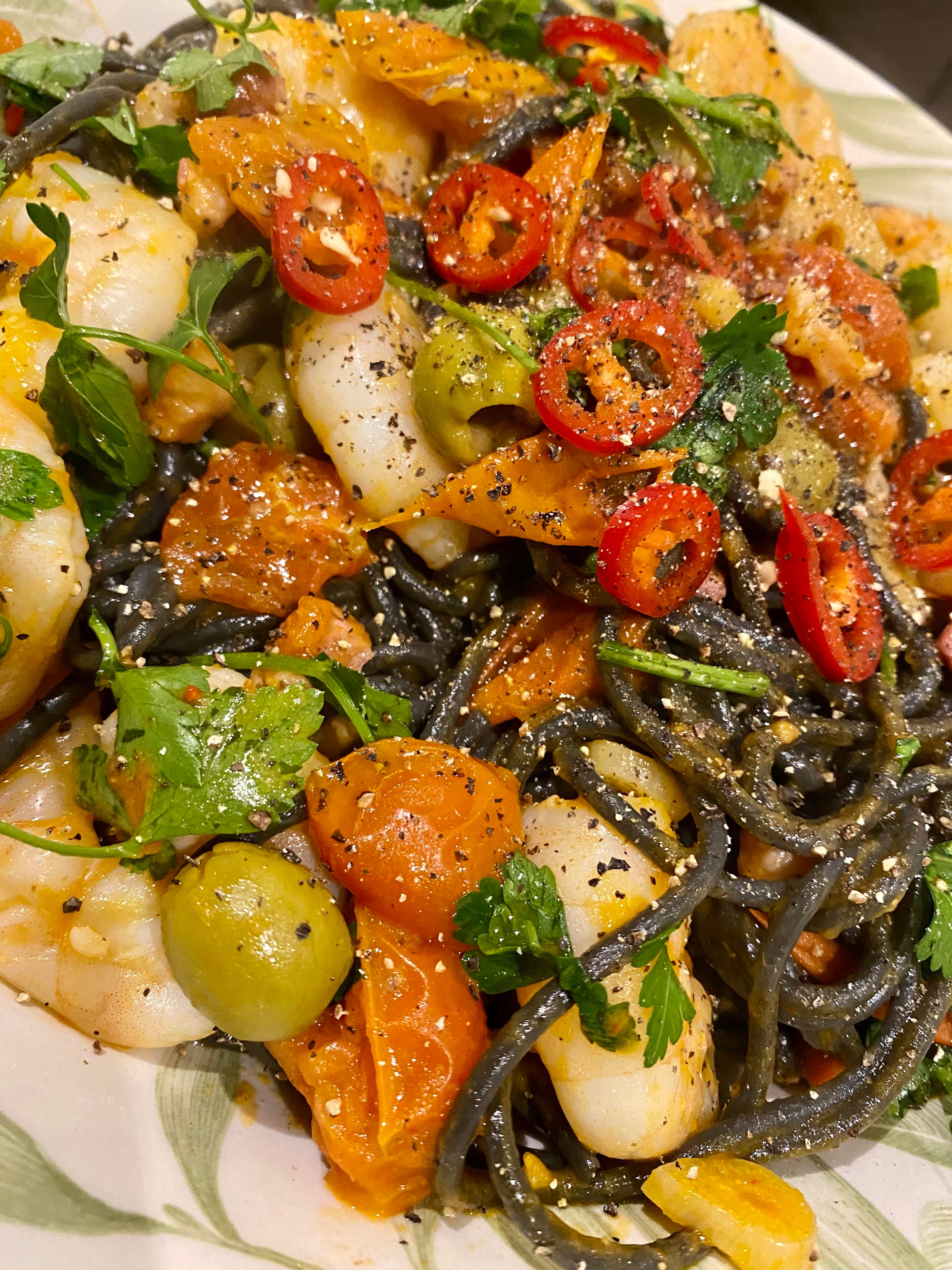 Squid Ink Spaghetti with king prawns , chilli and garlic Dining and