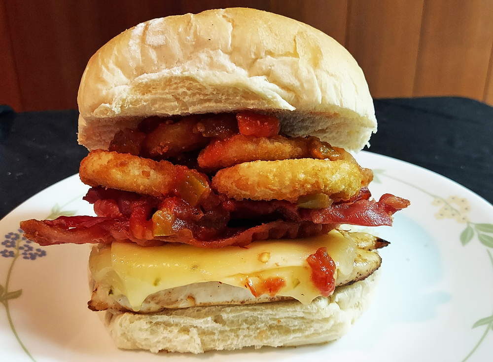 Grilled chicken, pepper jack cheese, bacon, and onion rings with