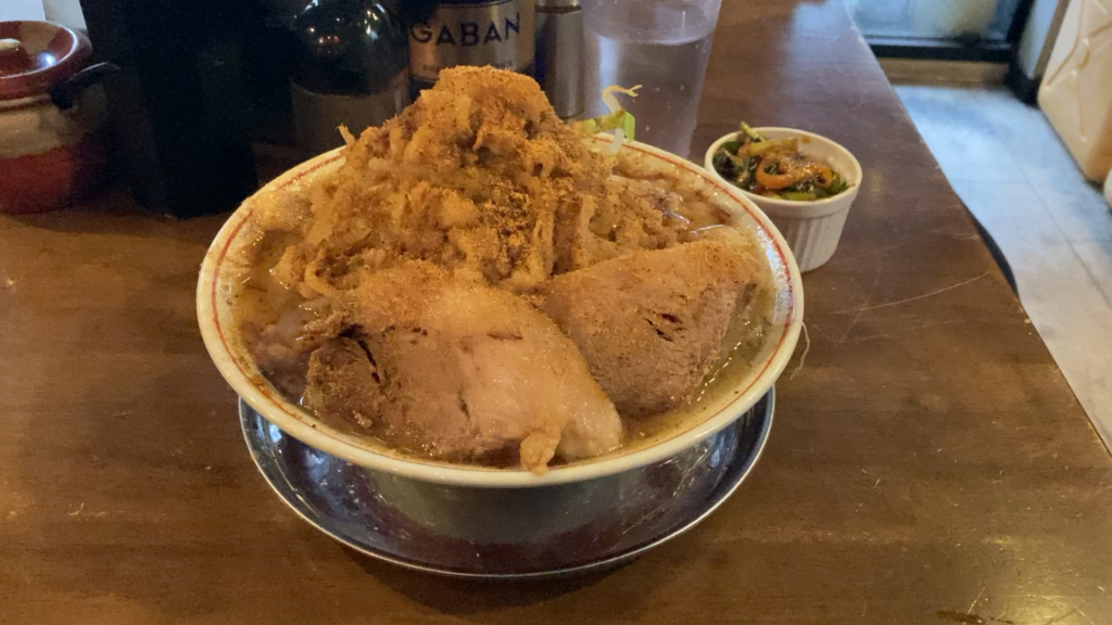 Jiro style ramen with extra “gyofun” niboshi powder on top at Butashima in Tokyo
