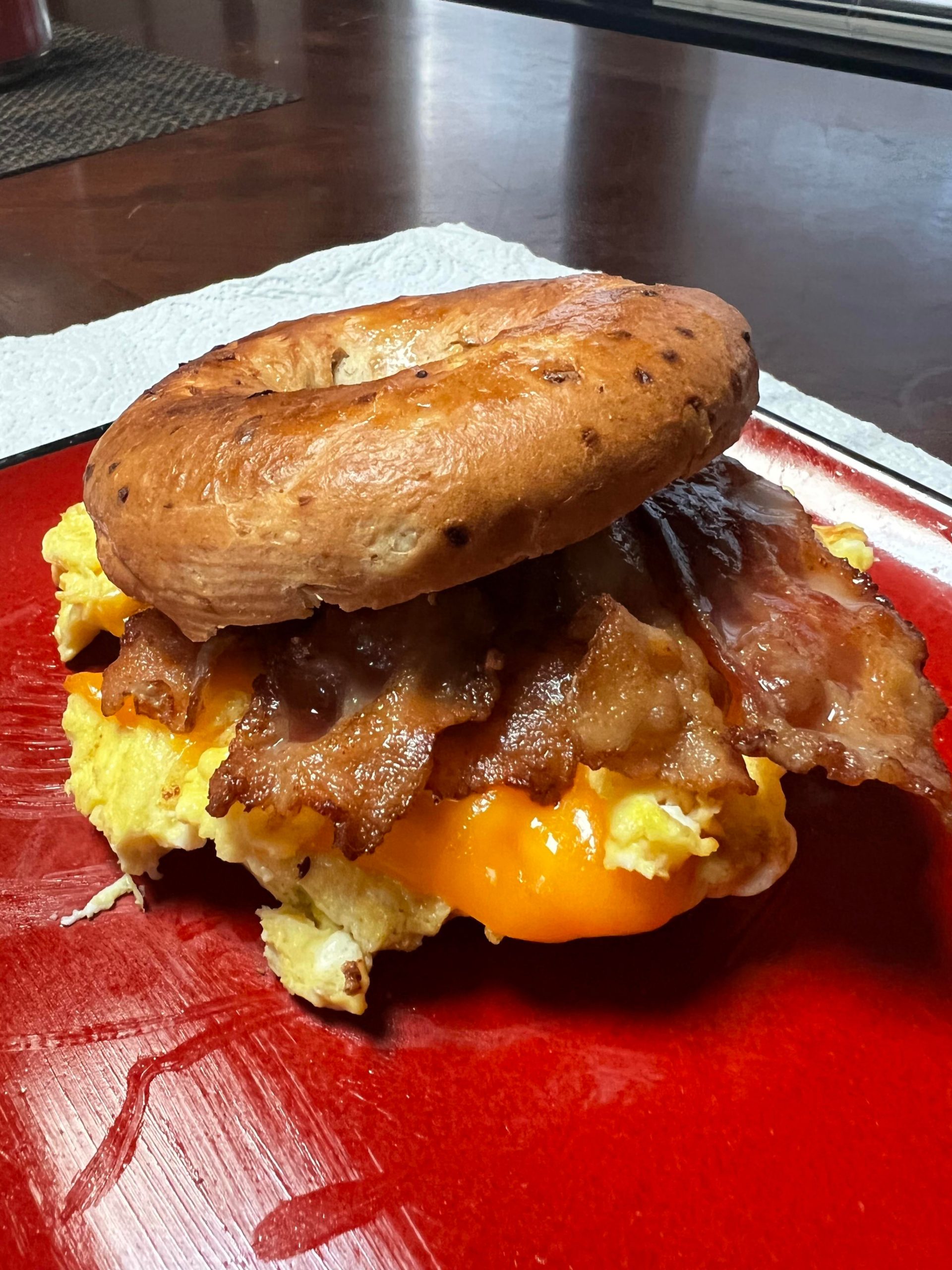 My bacon, egg, and cheddar cheese sandwich on onion bagel from this