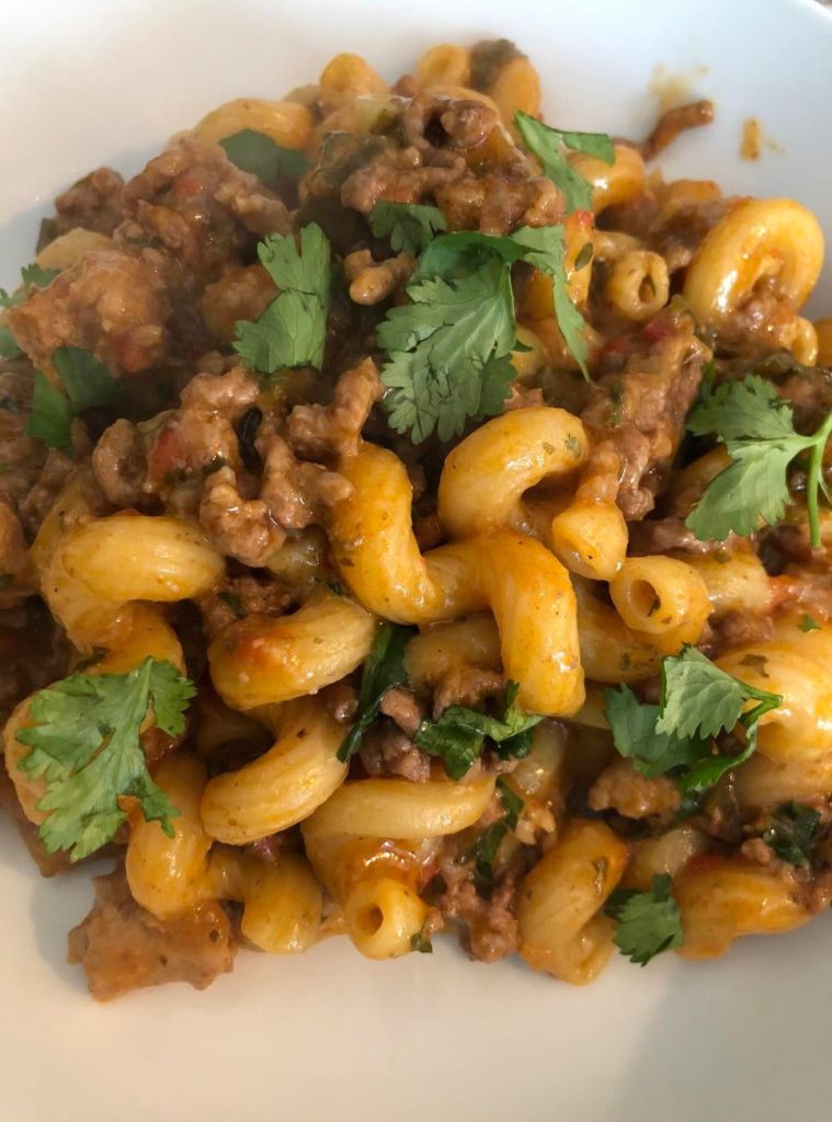 Homemade spiral pasta bolognese