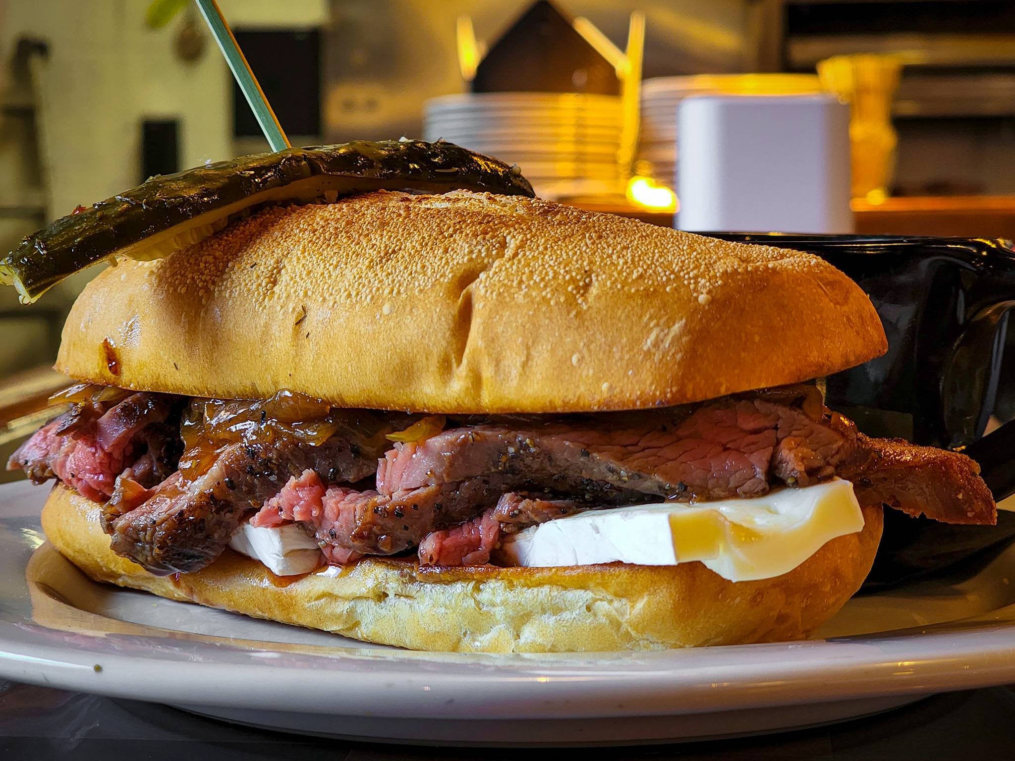 French Dip w/ Brie, sous vide flank, and caramelized onions French